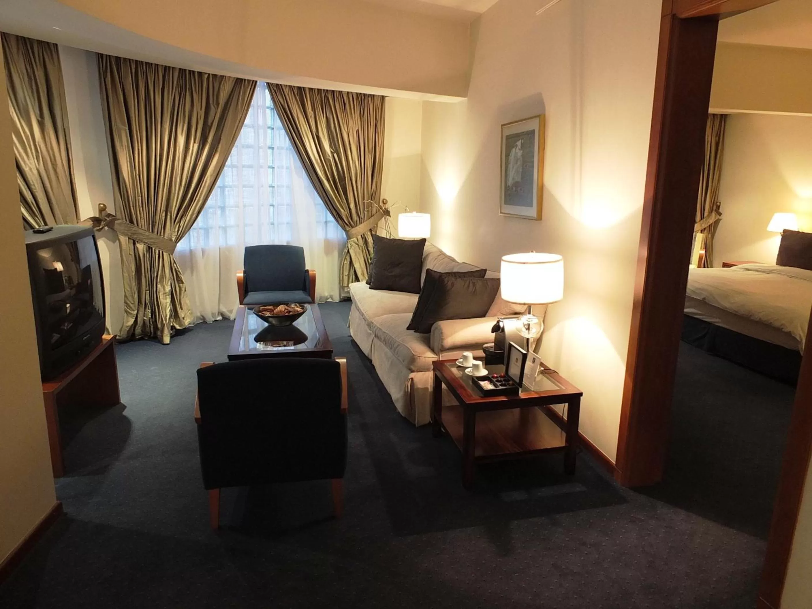 Living room, Bed in Plaza Hotel Beirut