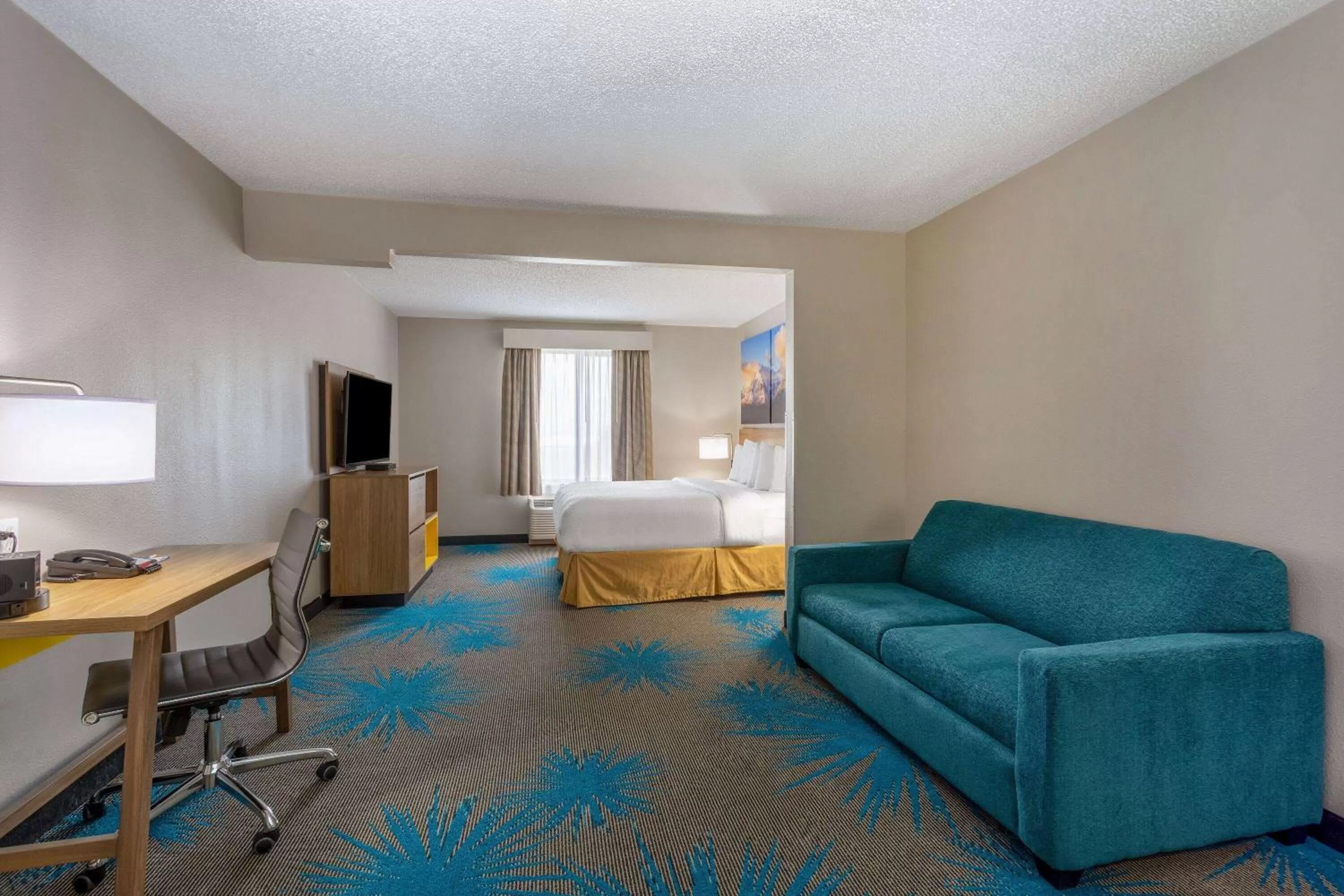 Bed in Days Inn & Suites by Wyndham Denver International Airport