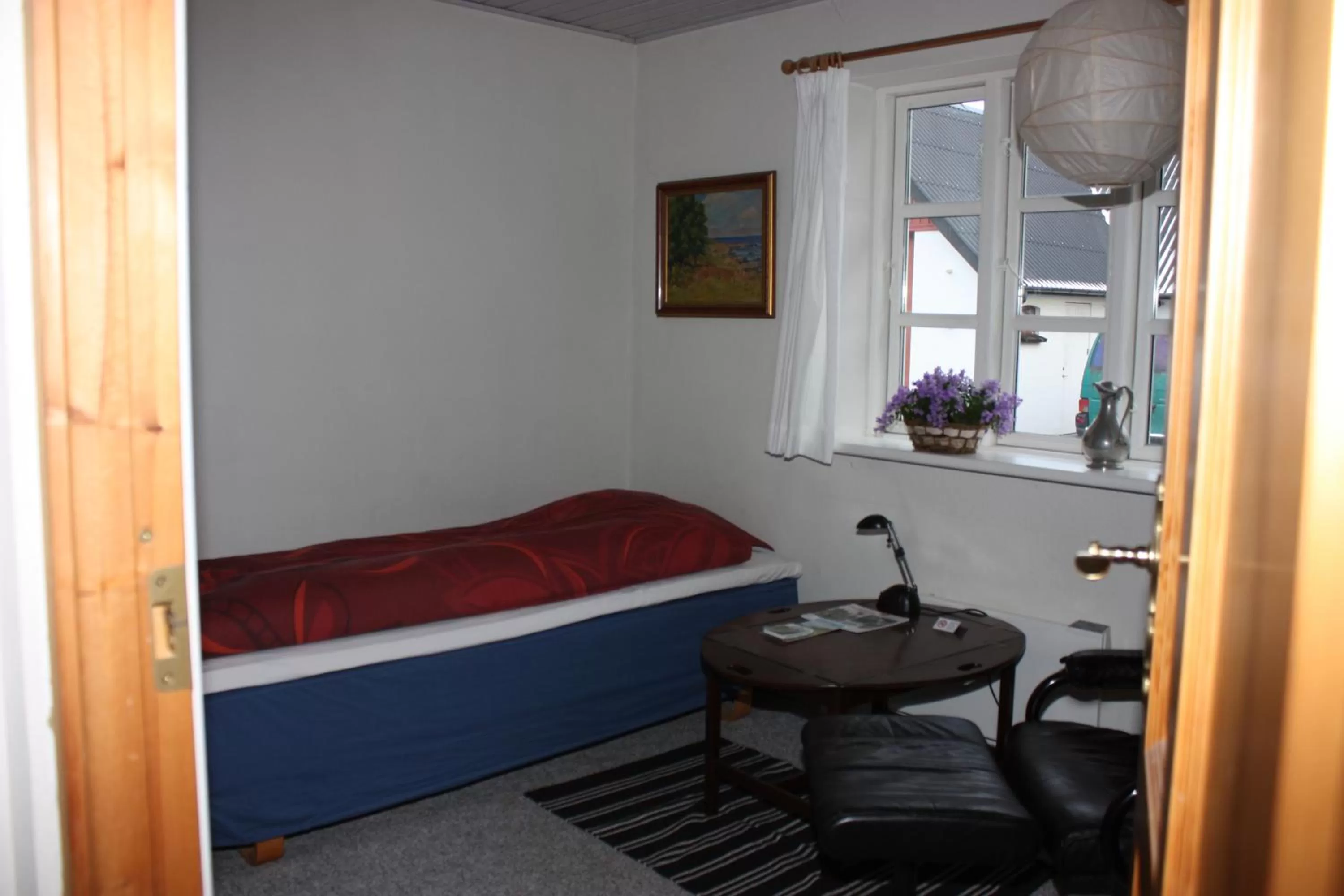 Bed in Holmehuset Bed & Breakfast