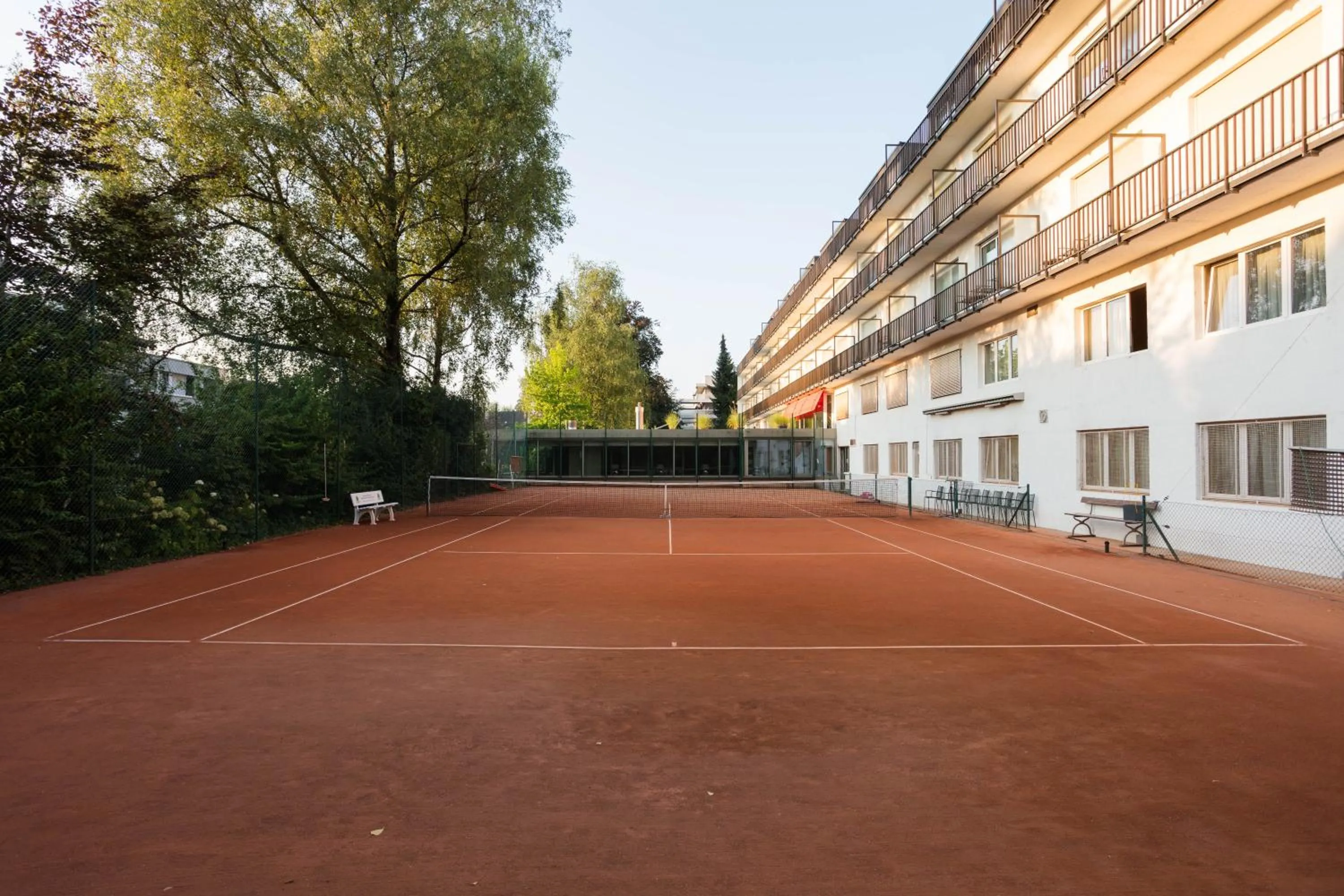 Tennis court in Engimatt City & Garden Hotel