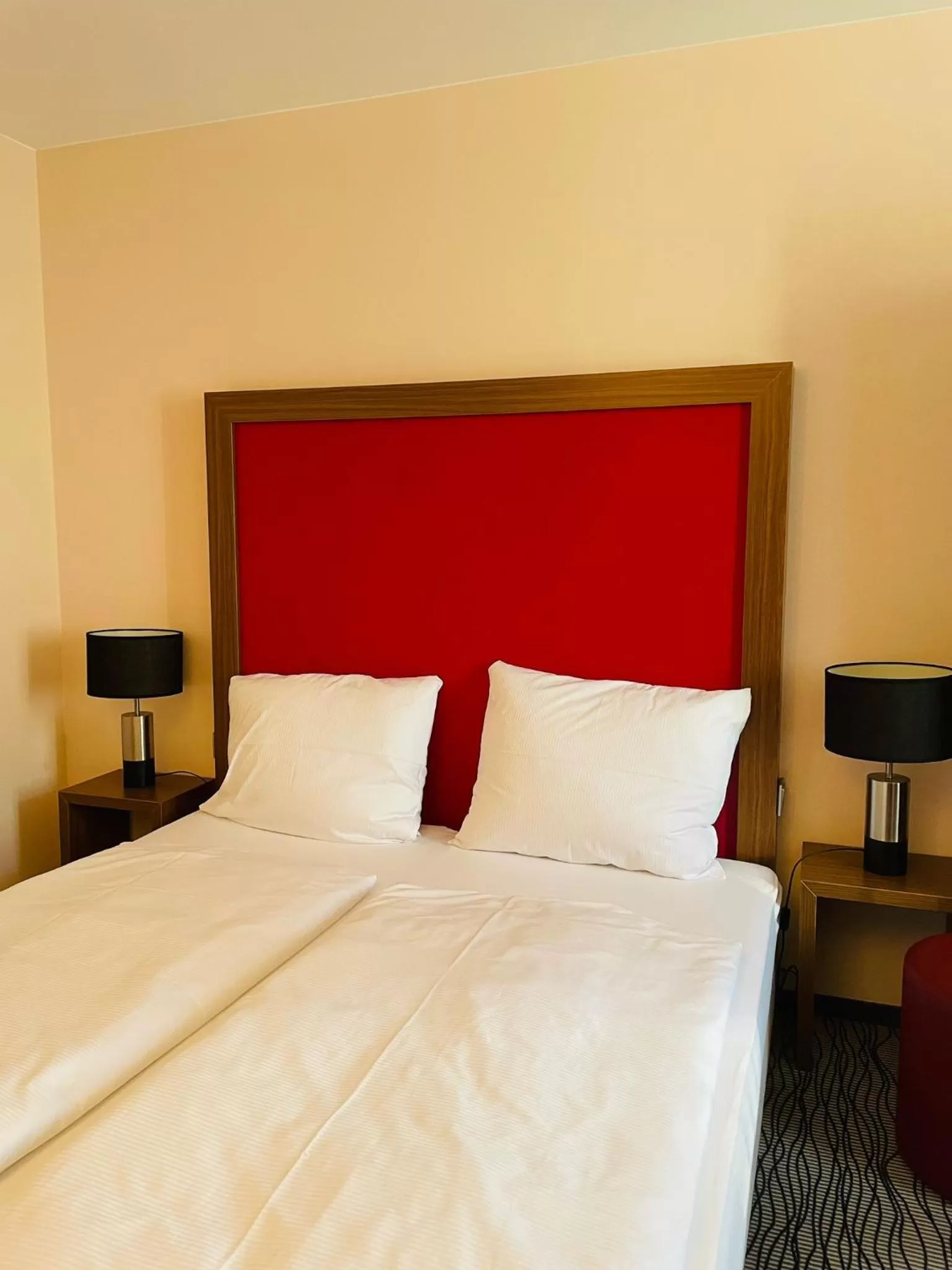 Bed in Point Hotel Apartments and Rooms