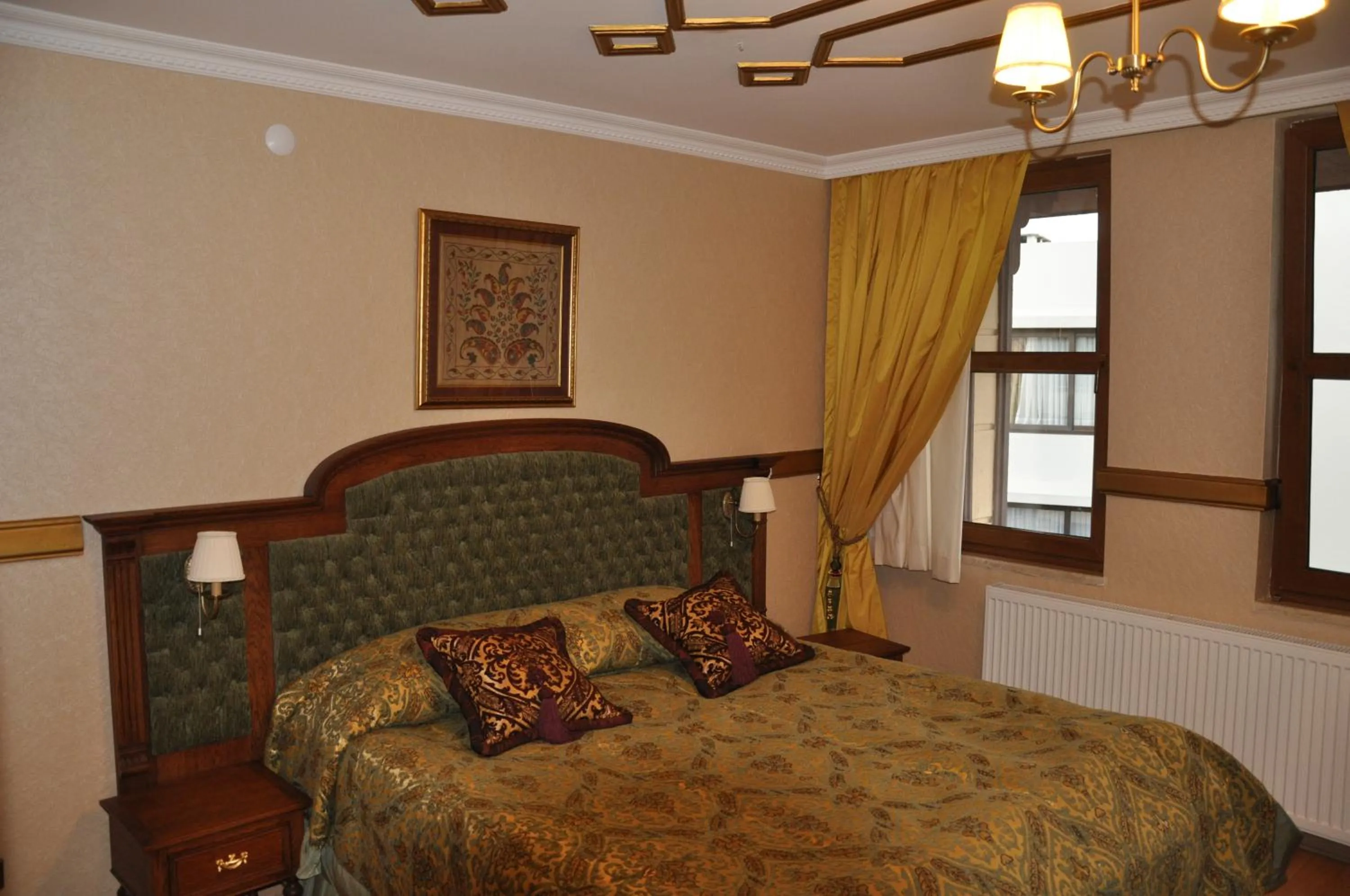 Bed in Aruna Boutique Hotel