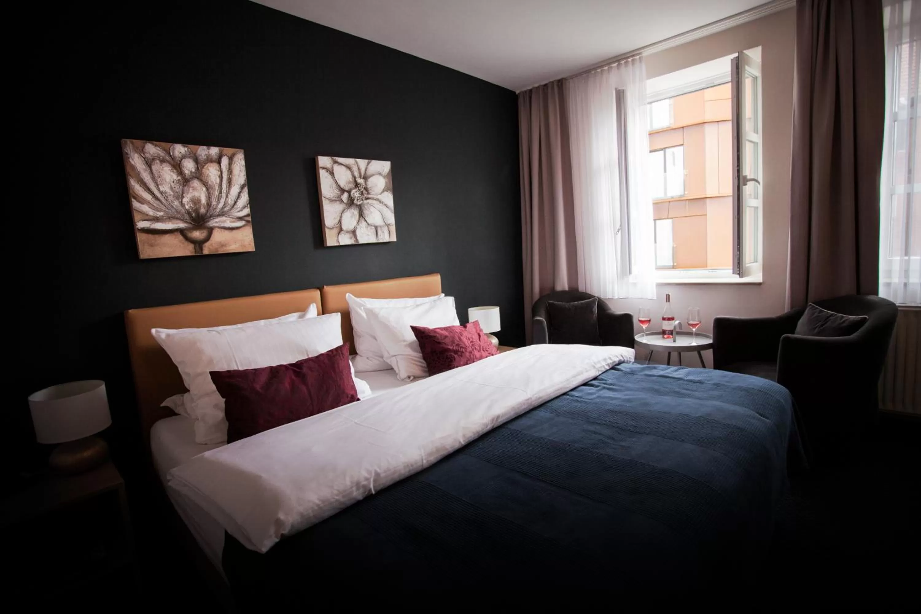 Bed in ONNO Boutique Hotel & Apartments