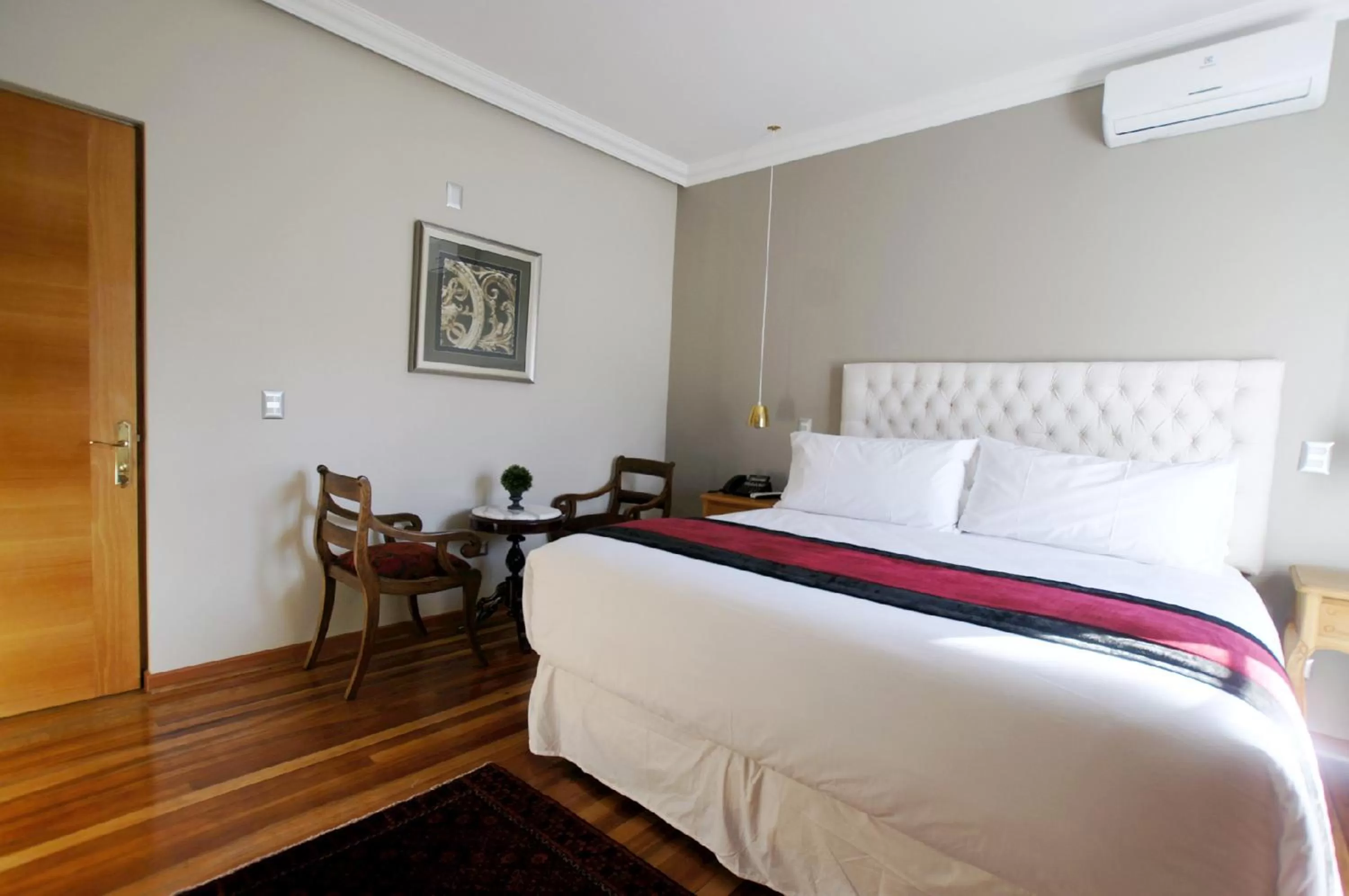 Bed in Quiral Hotel Boutique