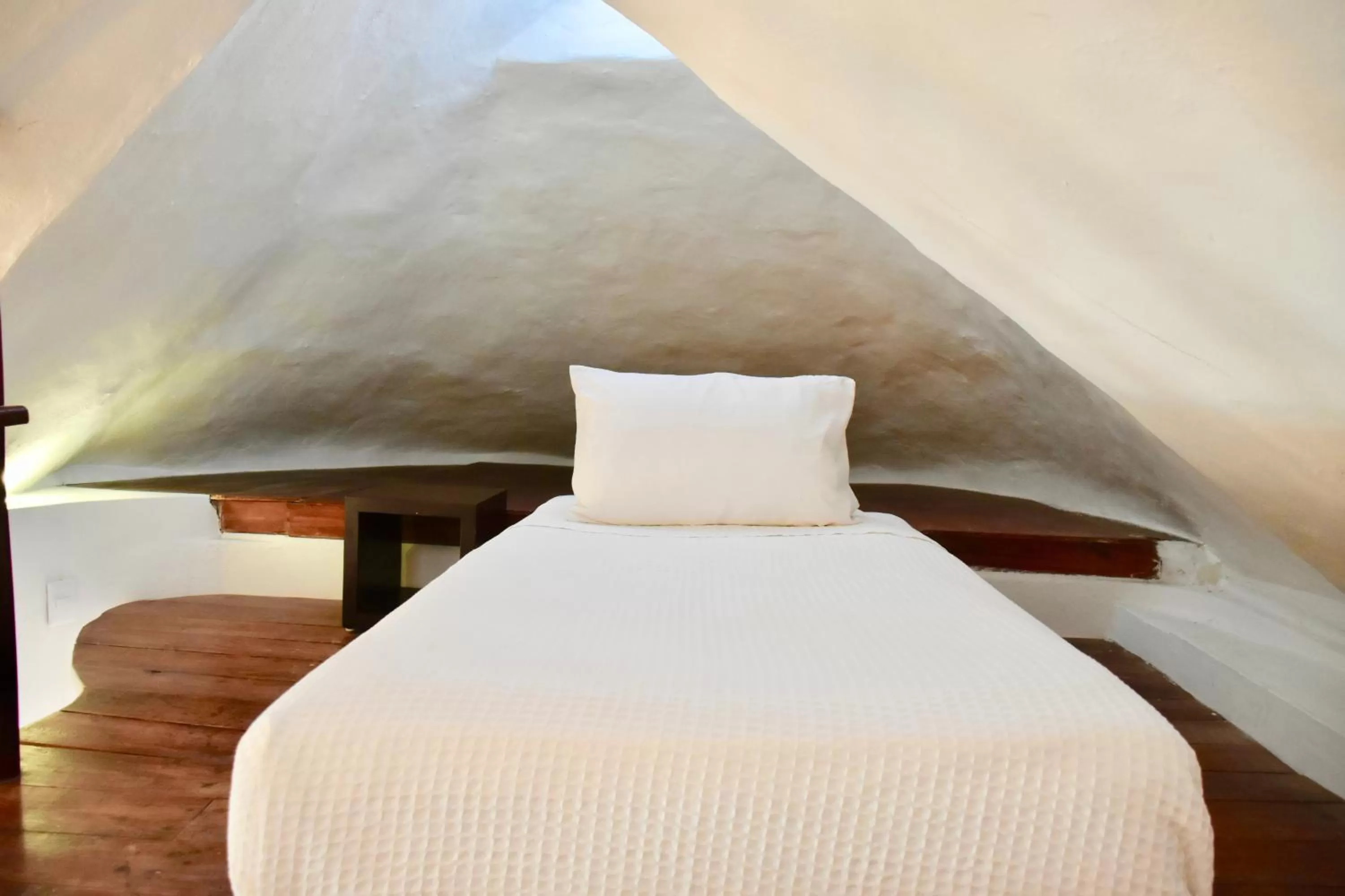 Bed in Playa Palms Beach Hotel