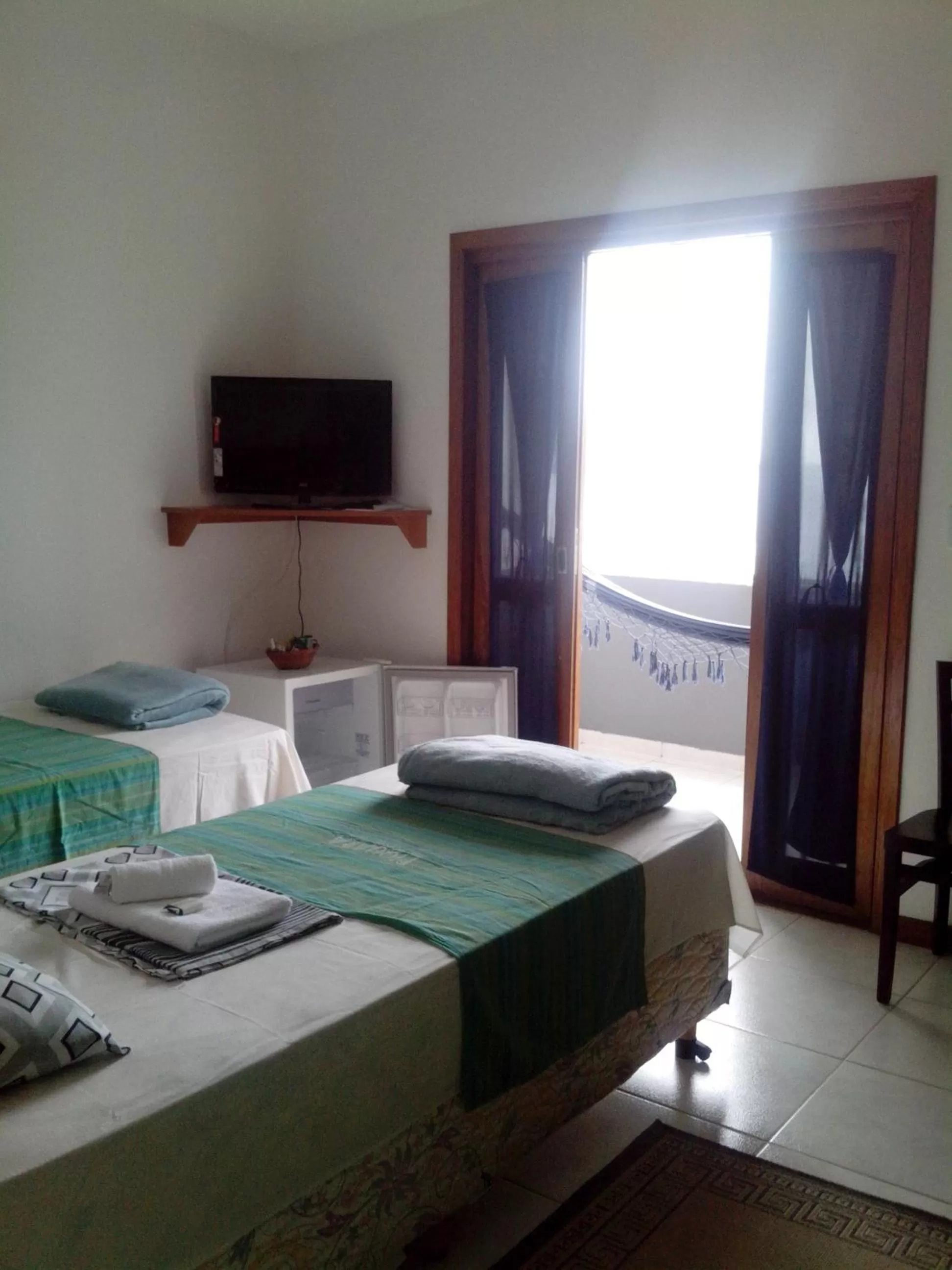 Photo of the whole room, Bed in Pousada Piquara