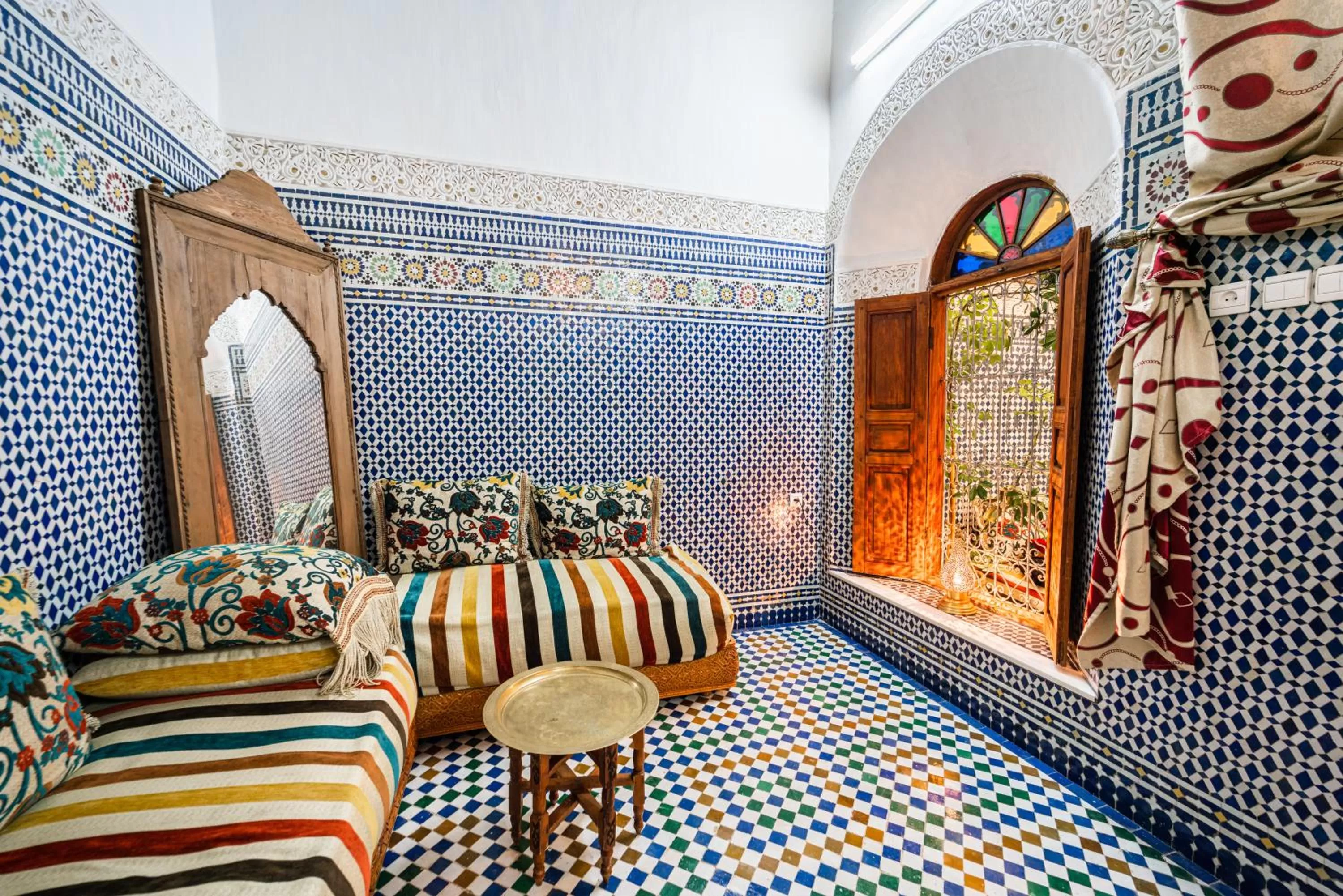Living room, Bed in Riad Taj Salma