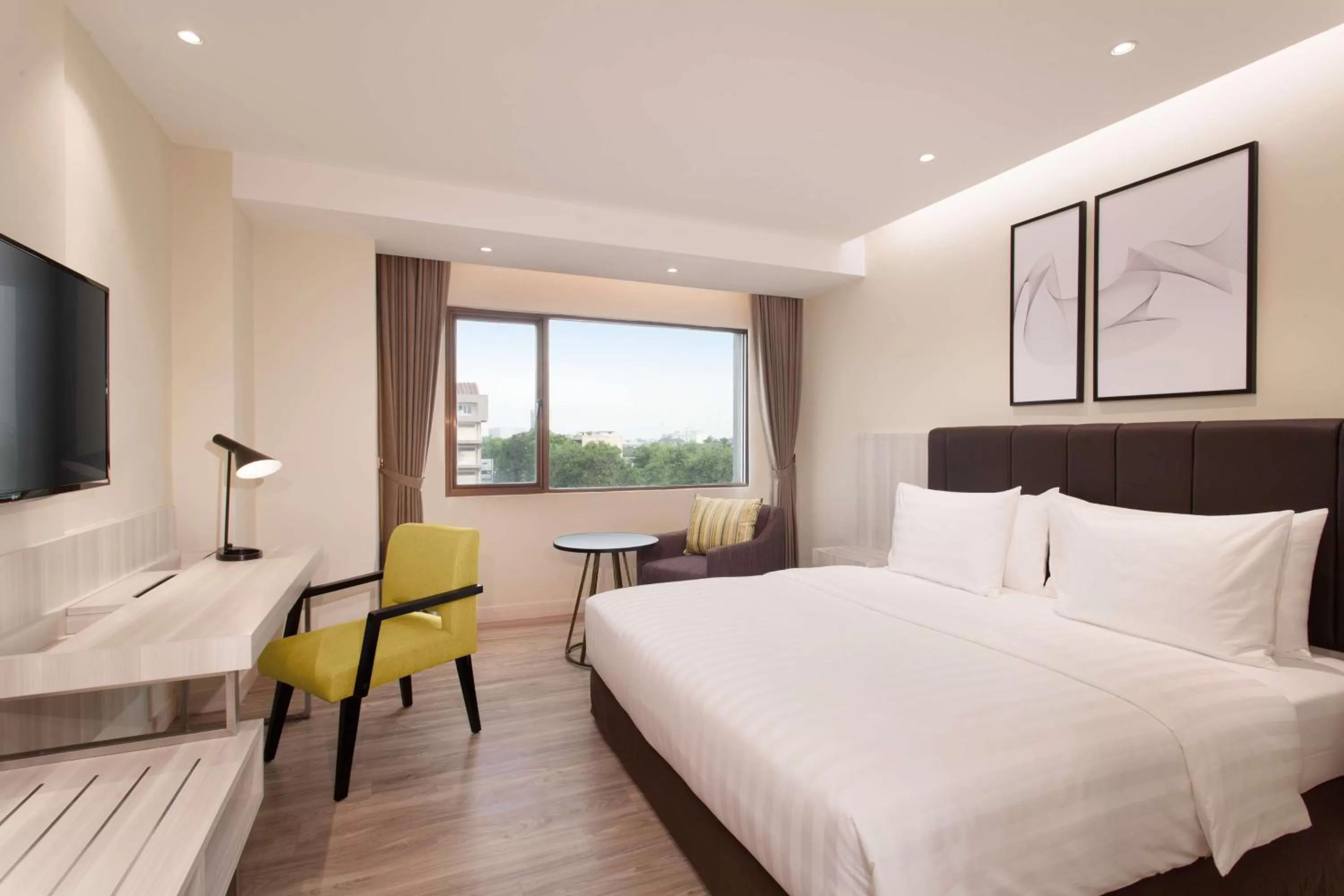 Photo of the whole room, Bed in AIHO Hotel Medan