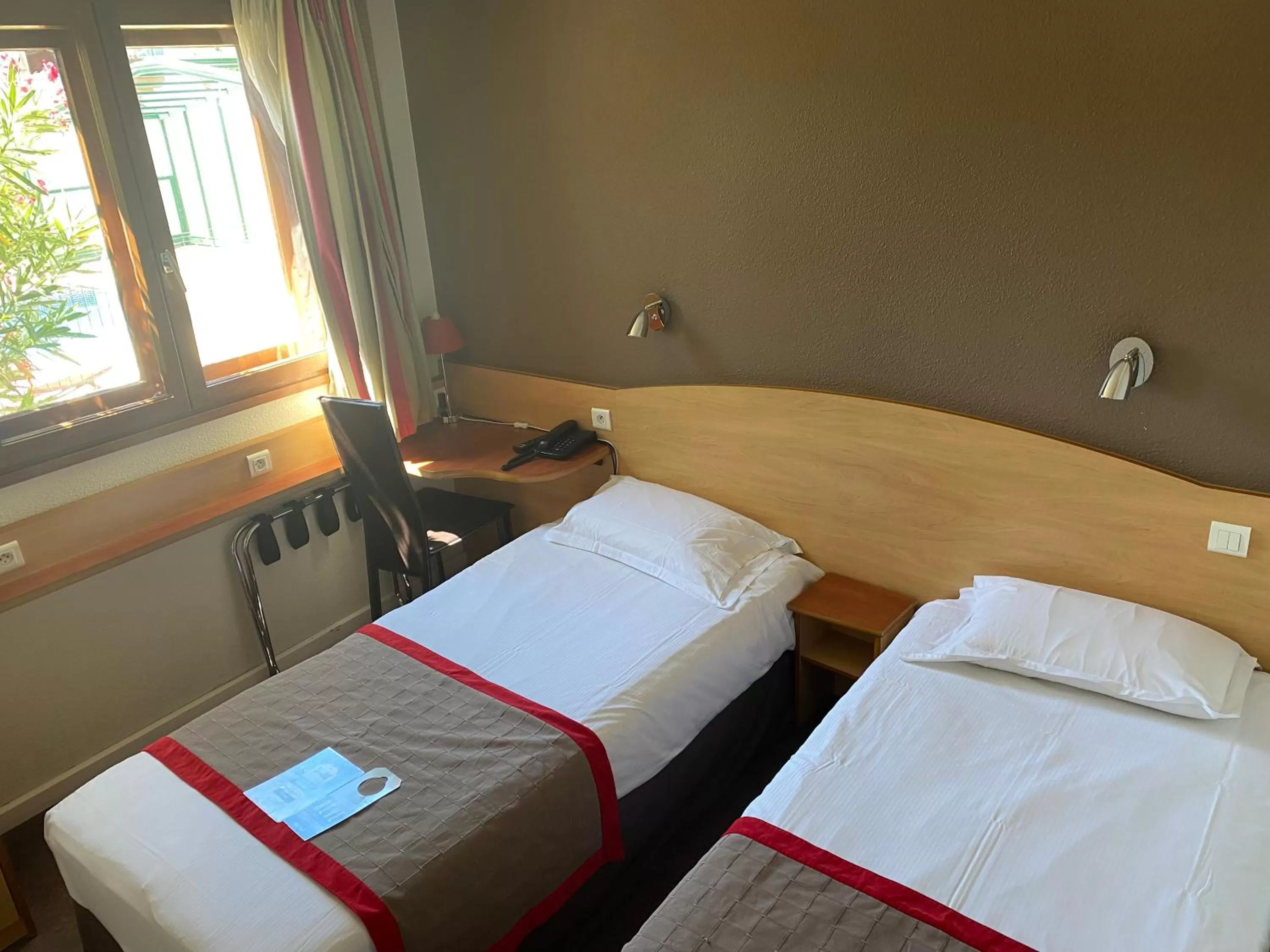 Bed in Kyriad Montpellier Aéroport - Gare Sud de France