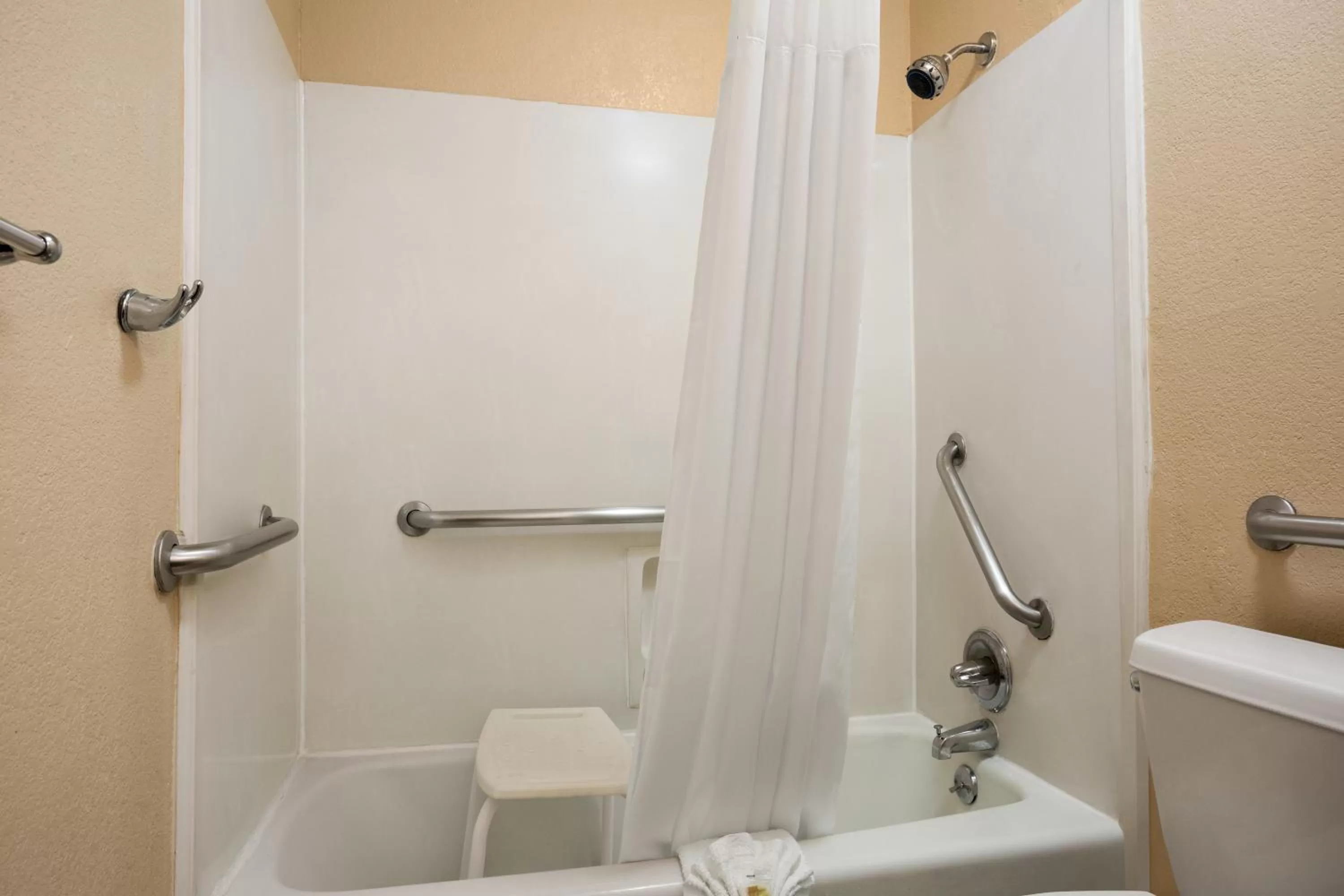 Bathroom in Days Inn by Wyndham Dallas Irving