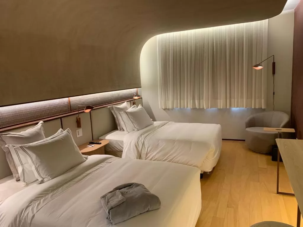 Bedroom, Bed in QOYA Hotel Curitiba, Curio Collection by Hilton