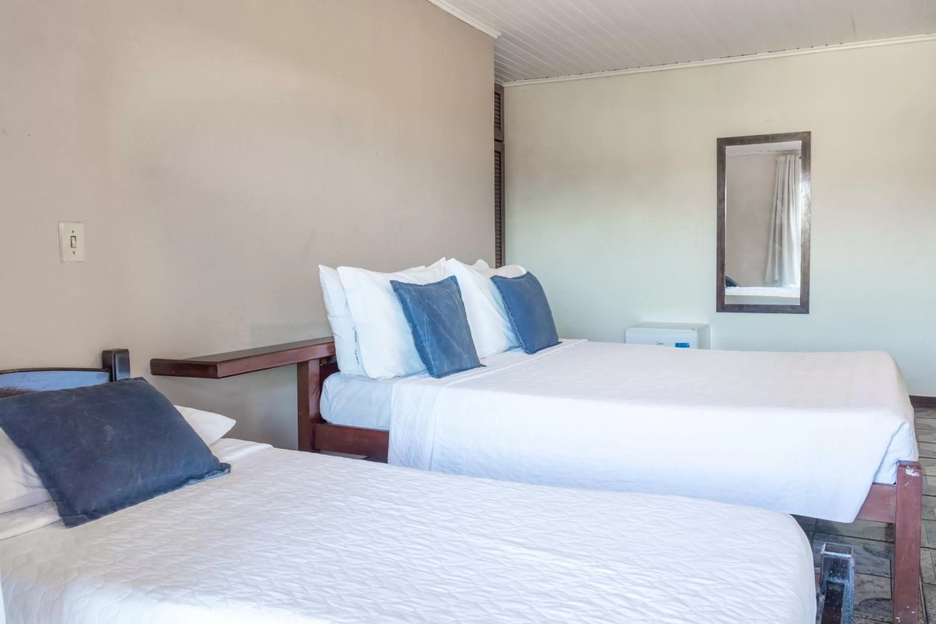 Bed in Pousada dos Coqueiros Búzios