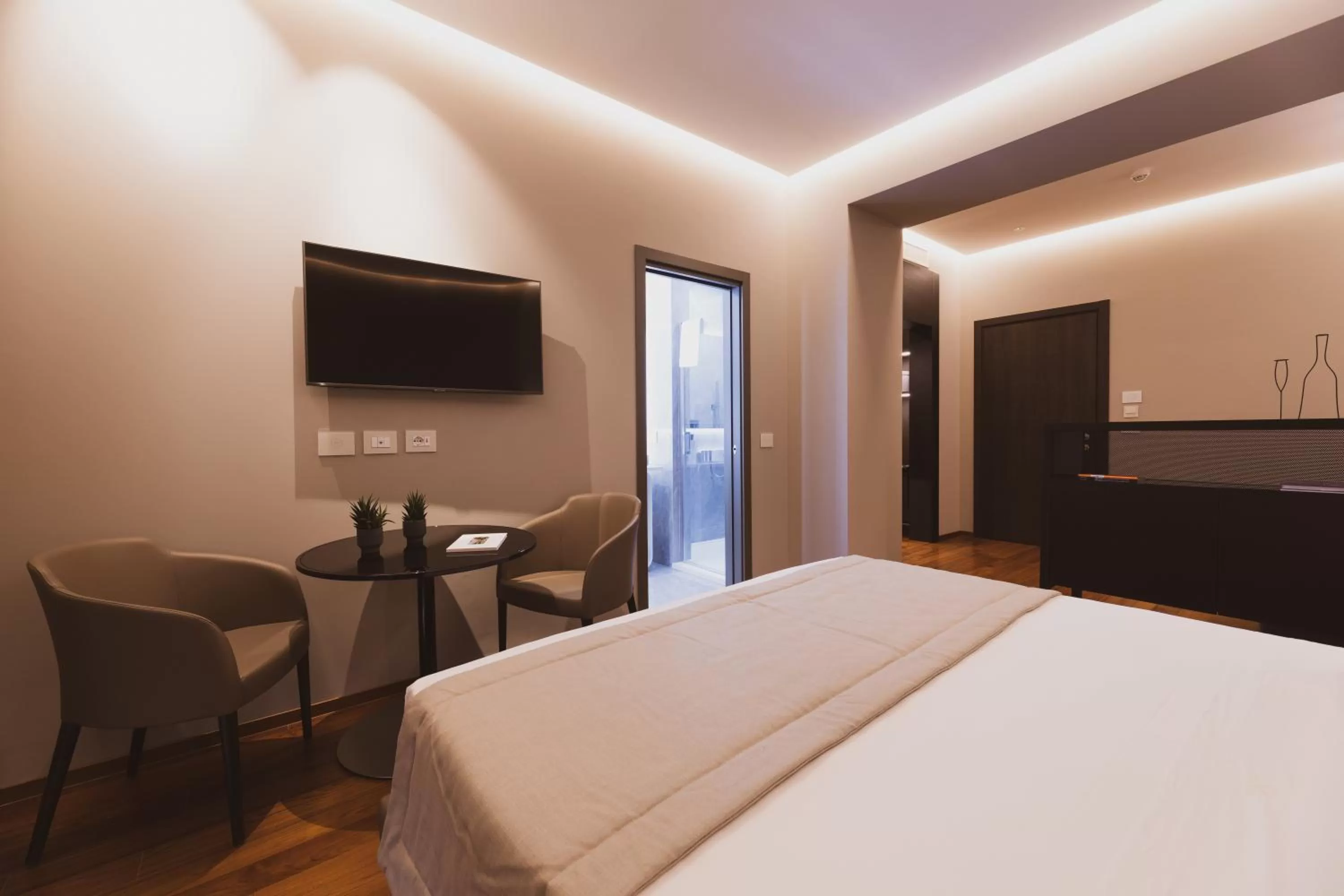 Seating area, Bed in Callistos Hotel & Spa