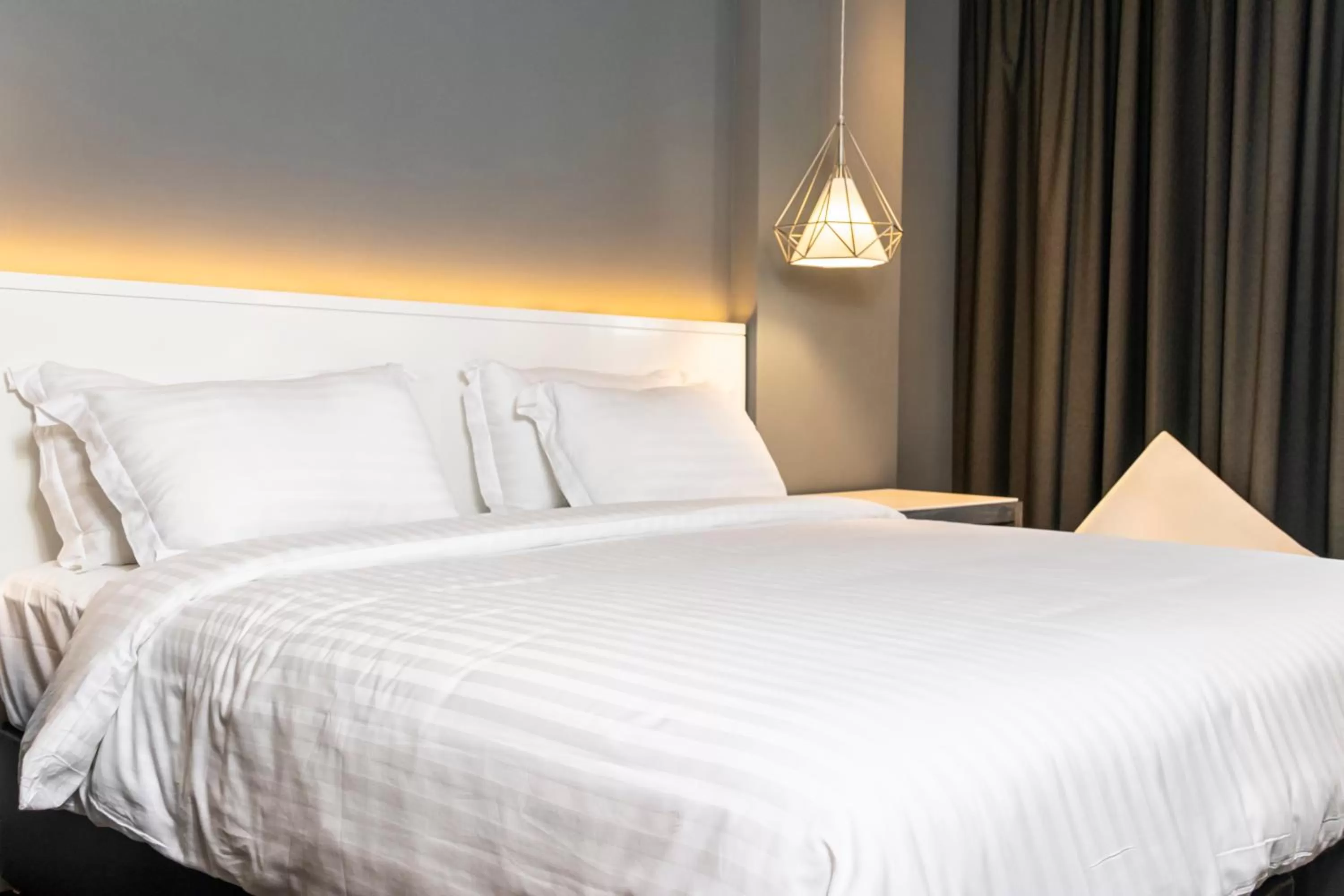 Bed in Trademark Hotel, a Member of Design Hotels