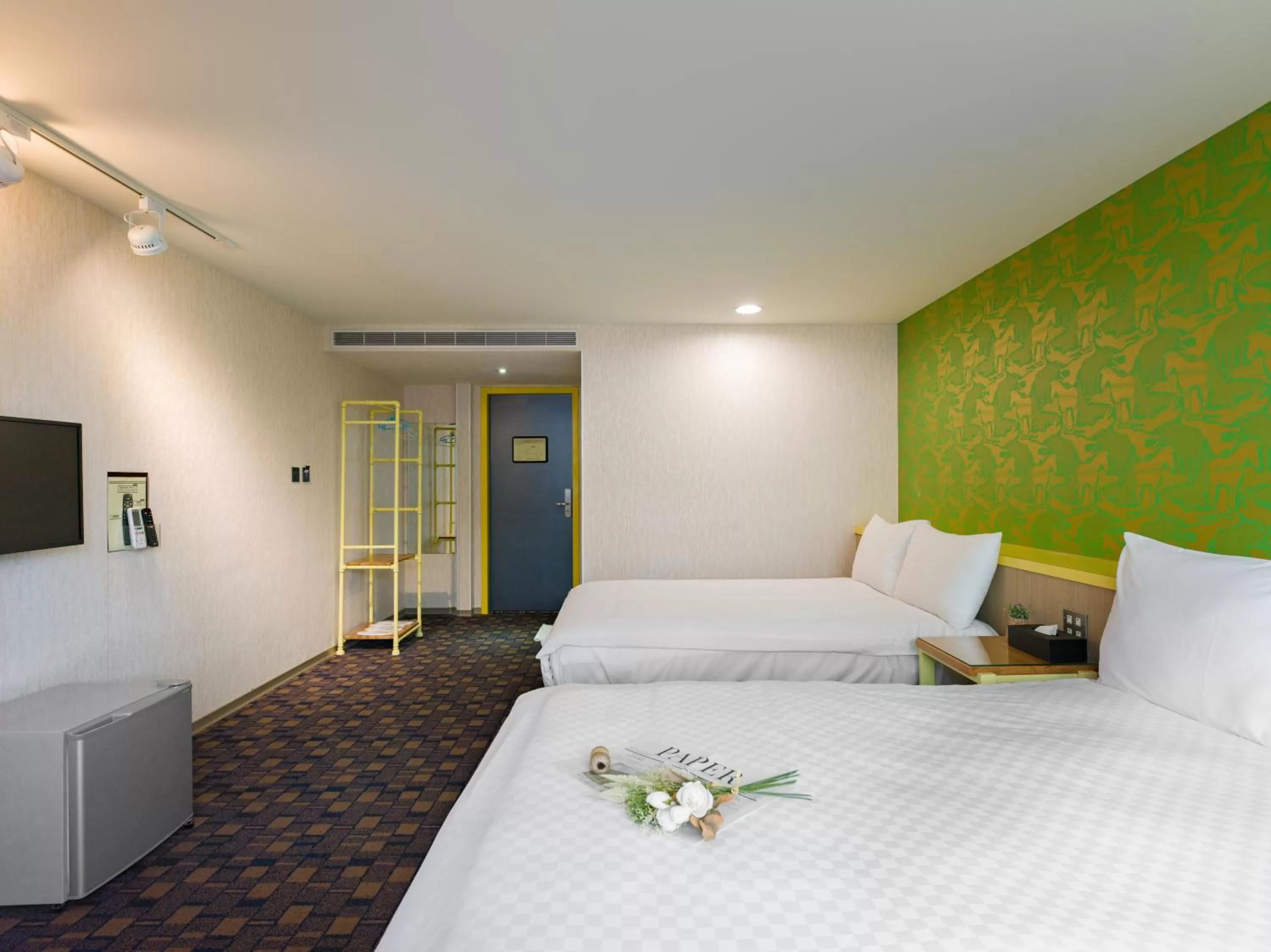 Bed in Ximenhotel-Xining西門大飯店-西寧館