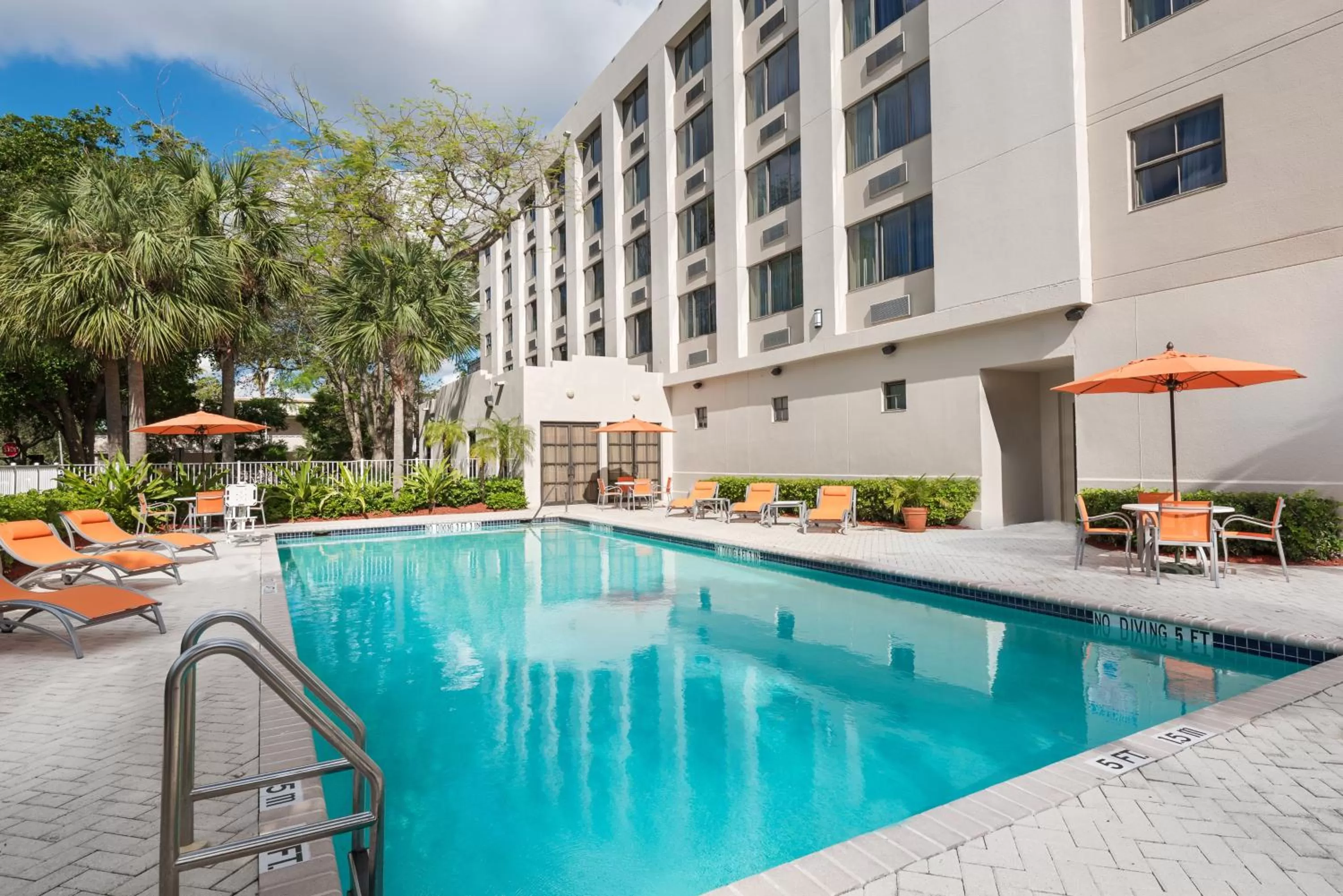 Swimming pool in Holiday Inn Express Hotel & Suites Ft. Lauderdale-Plantation by IHG