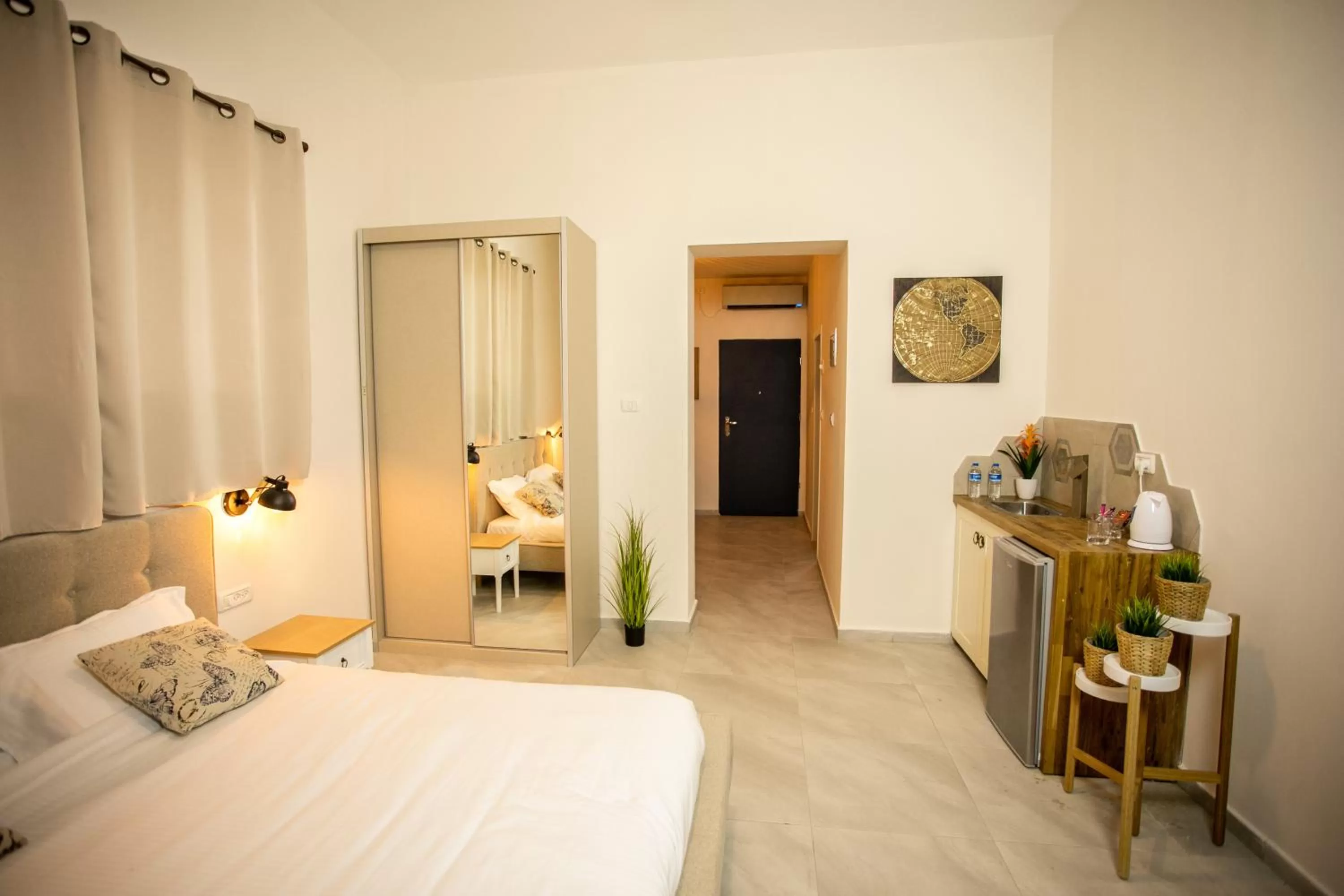 Photo of the whole room, TV/Entertainment Center in Eshel Mansion - Boutique Suites