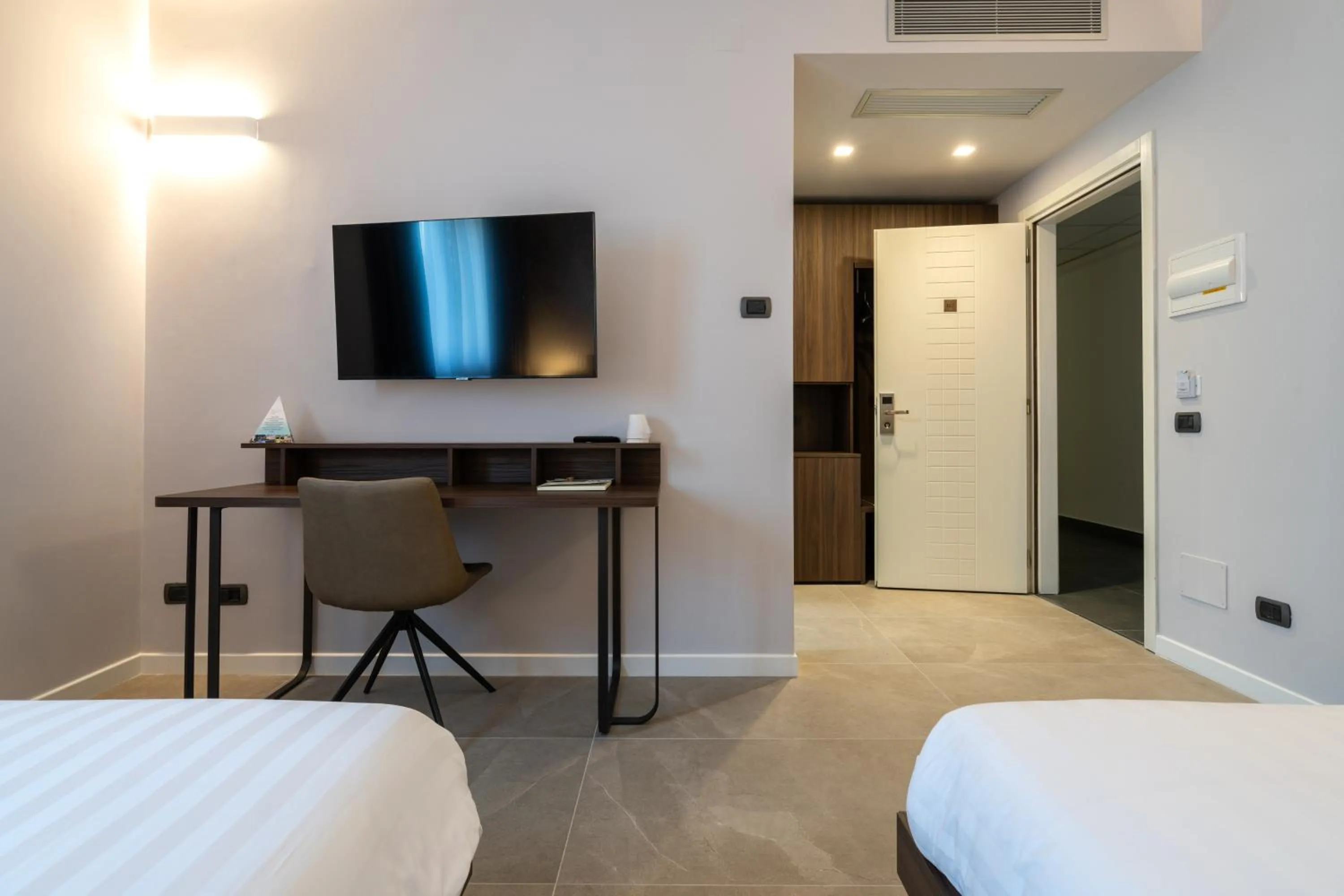 Photo of the whole room, Bed in Ulivi Hotel & Residence