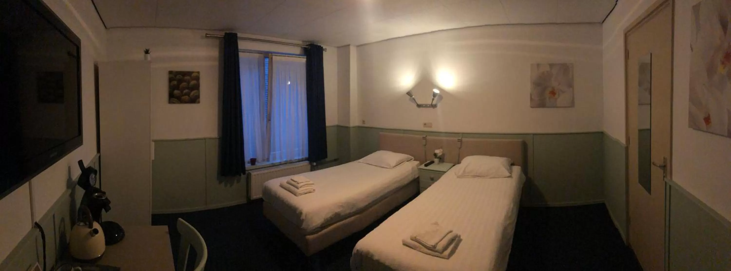 Bed in Hotel Verhoeven