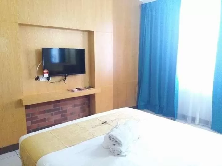 Bed in Fratini's Hotel Labuan