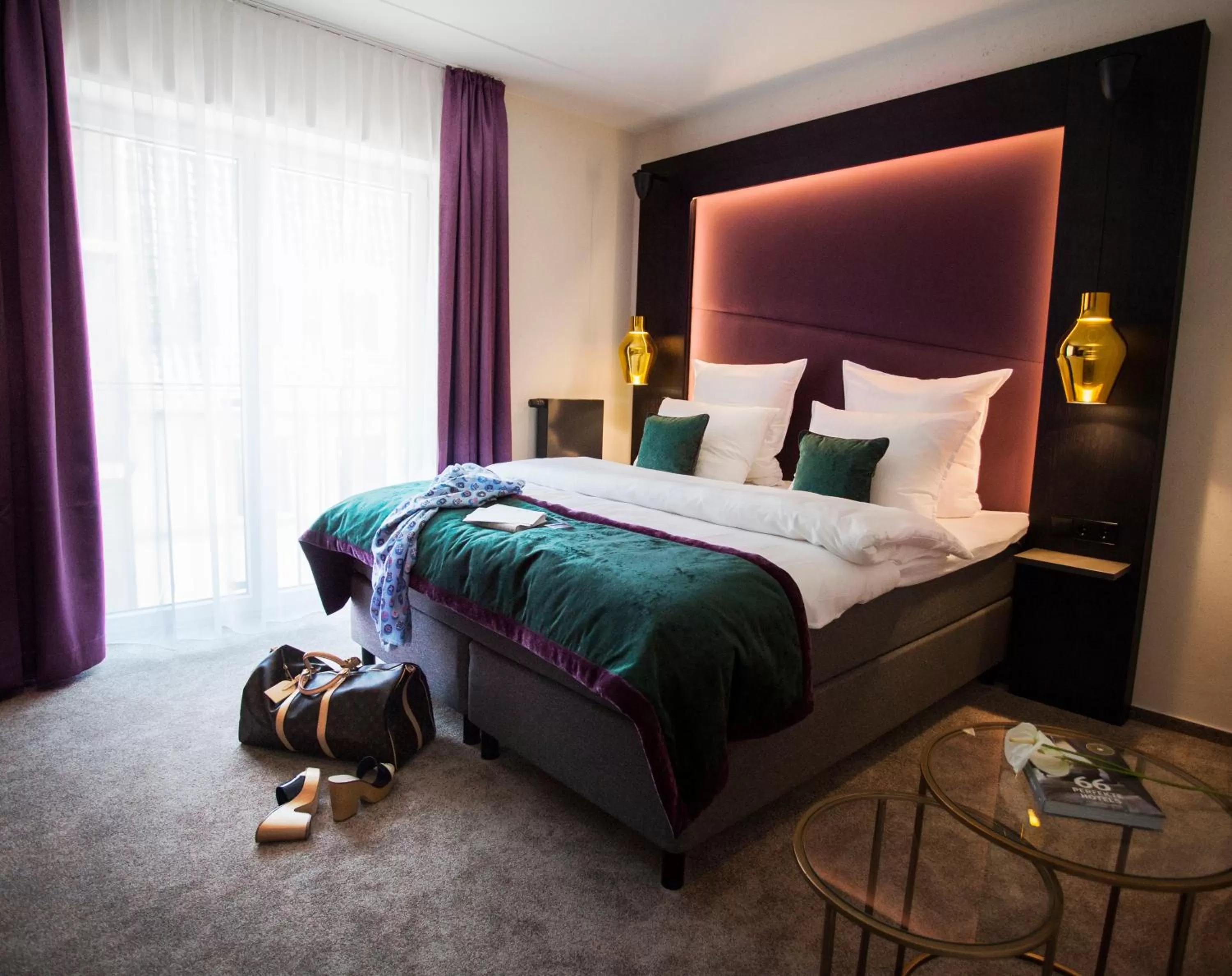 Bed in ONNO Boutique Hotel & Apartments