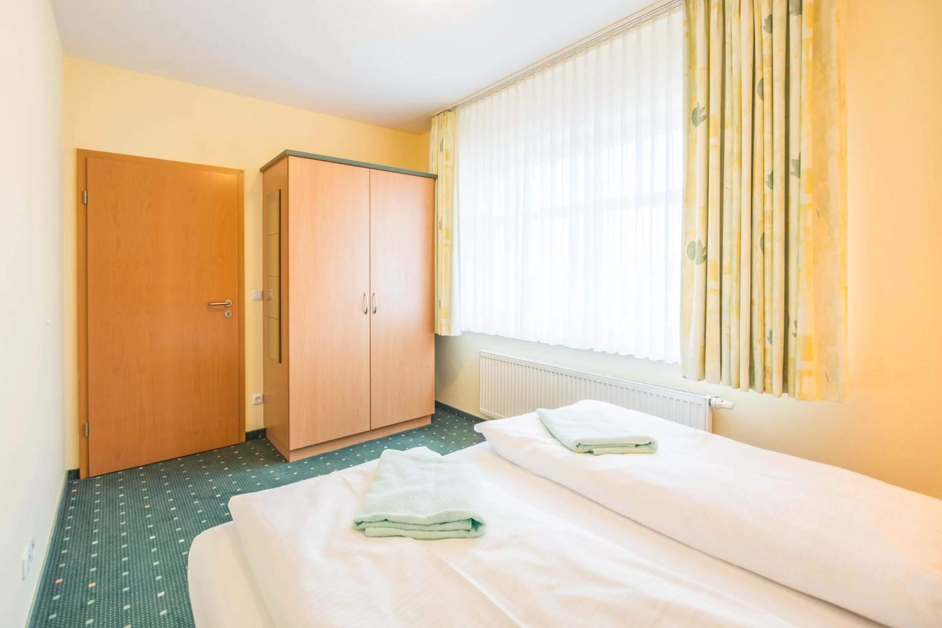 Photo of the whole room, Bed in Am Weststrand Aparthotel Kühlungsborn