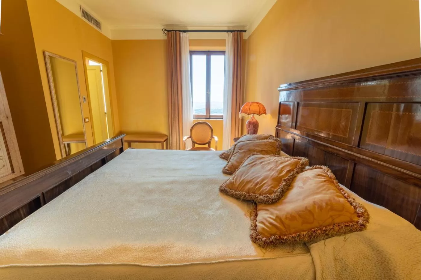 Bed in La Locanda Di San Francesco