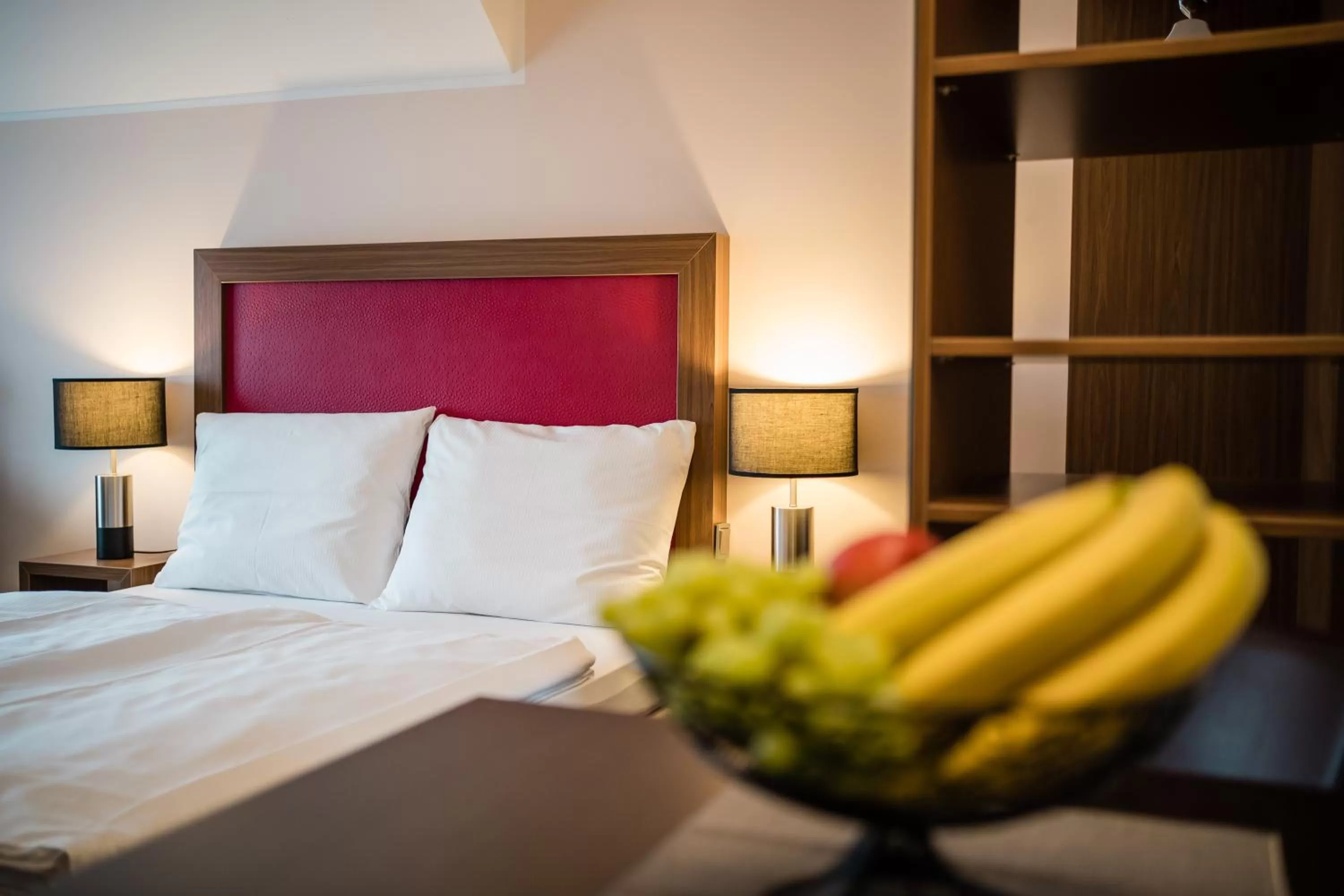 Bed in Point Hotel Apartments and Rooms