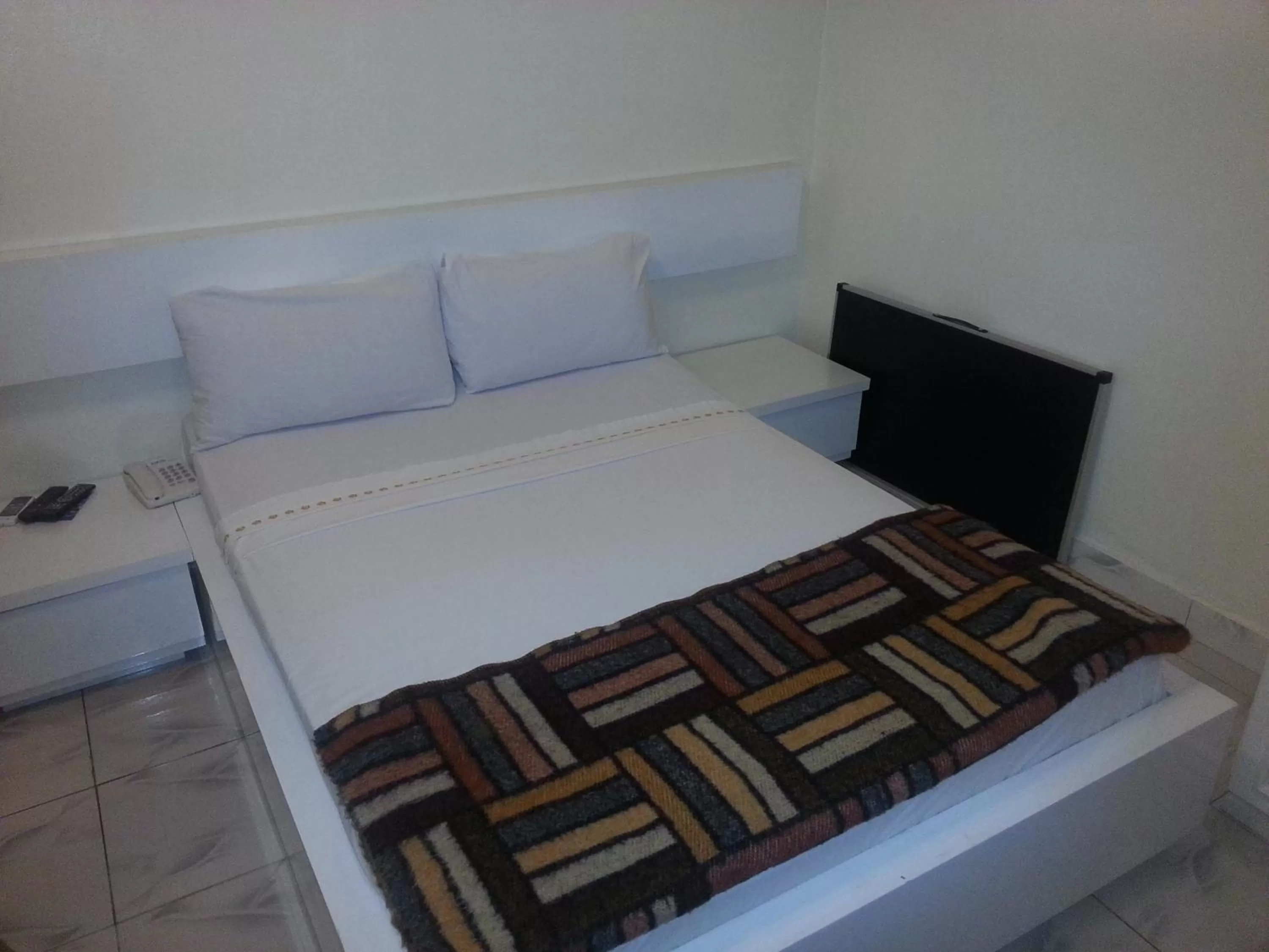 Bed in Woodpecker Resort Hotel