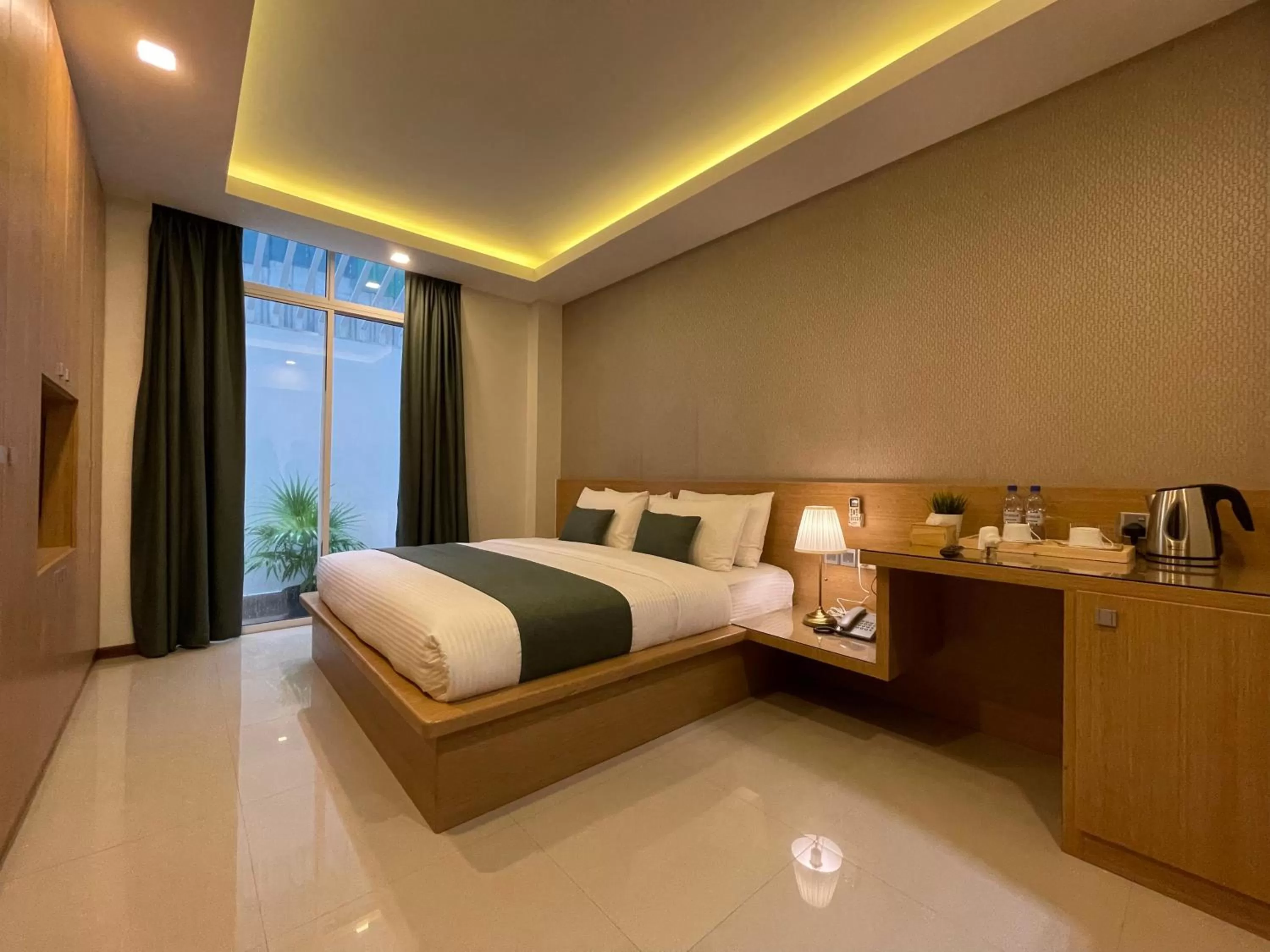 Photo of the whole room, Bed in Huvan Beach Hotel at Hulhumale
