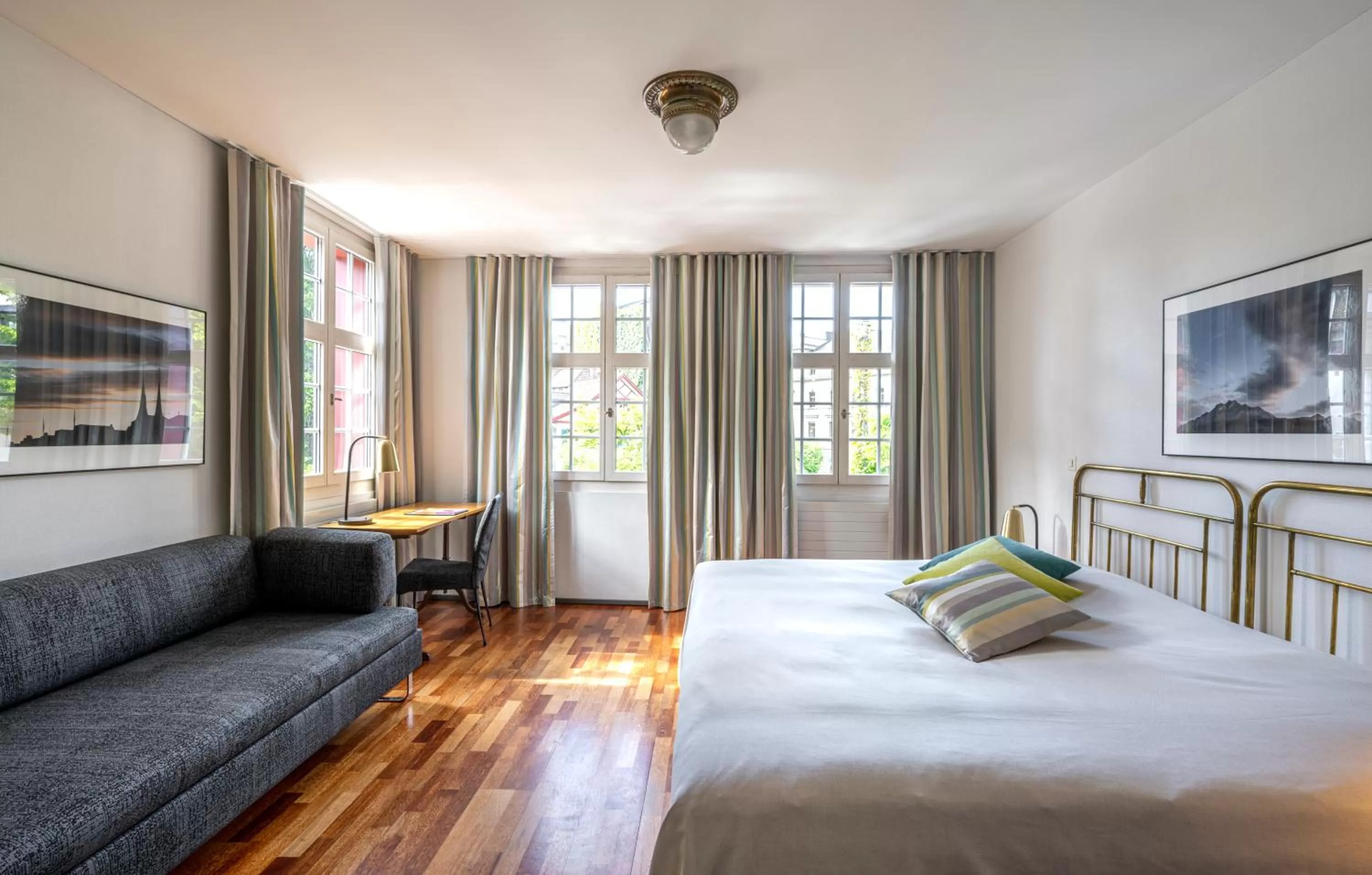 Photo of the whole room, Bed in Hotel Hofgarten Luzern