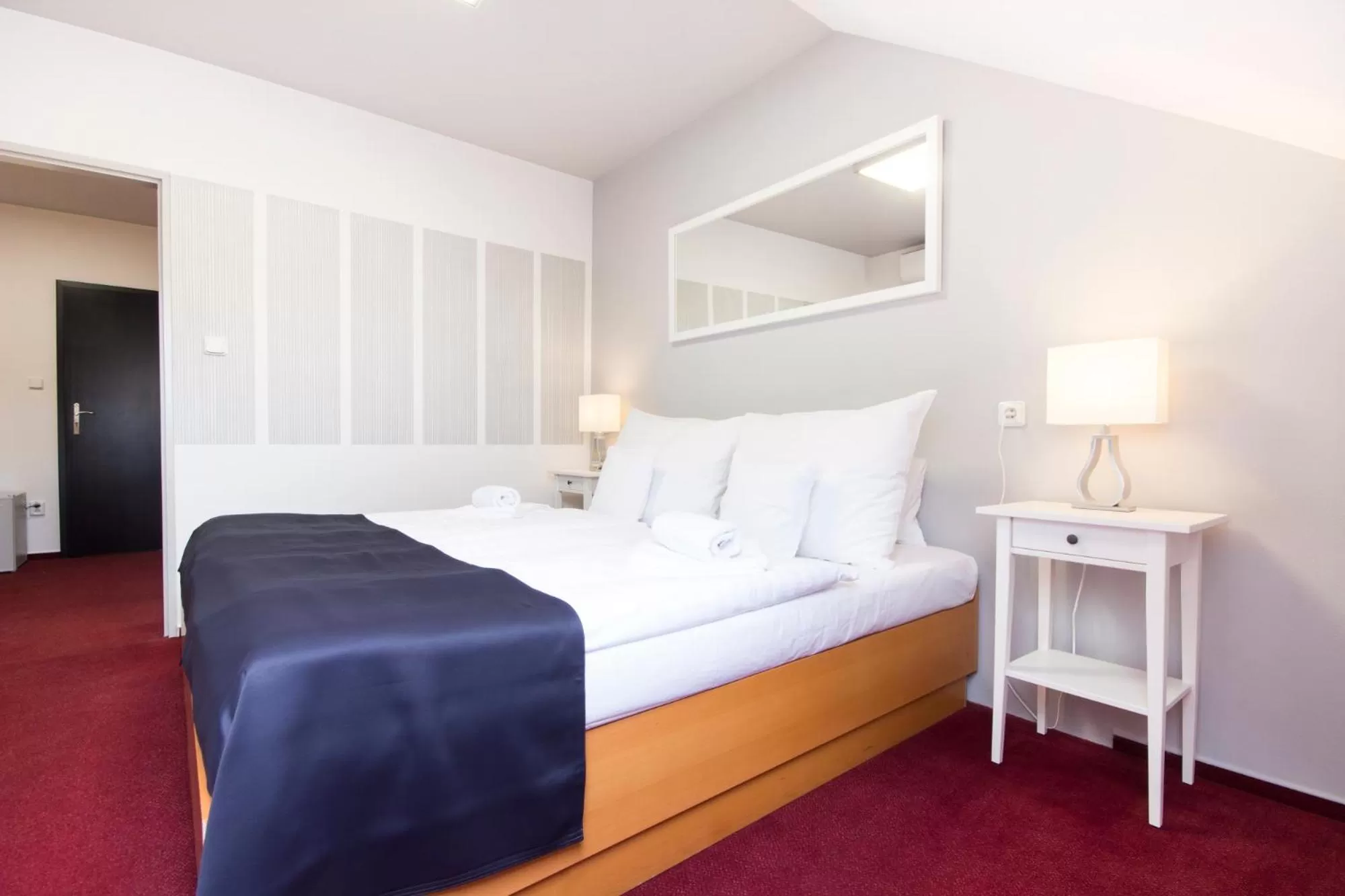 Bed in Hotel Maroli Mikulov