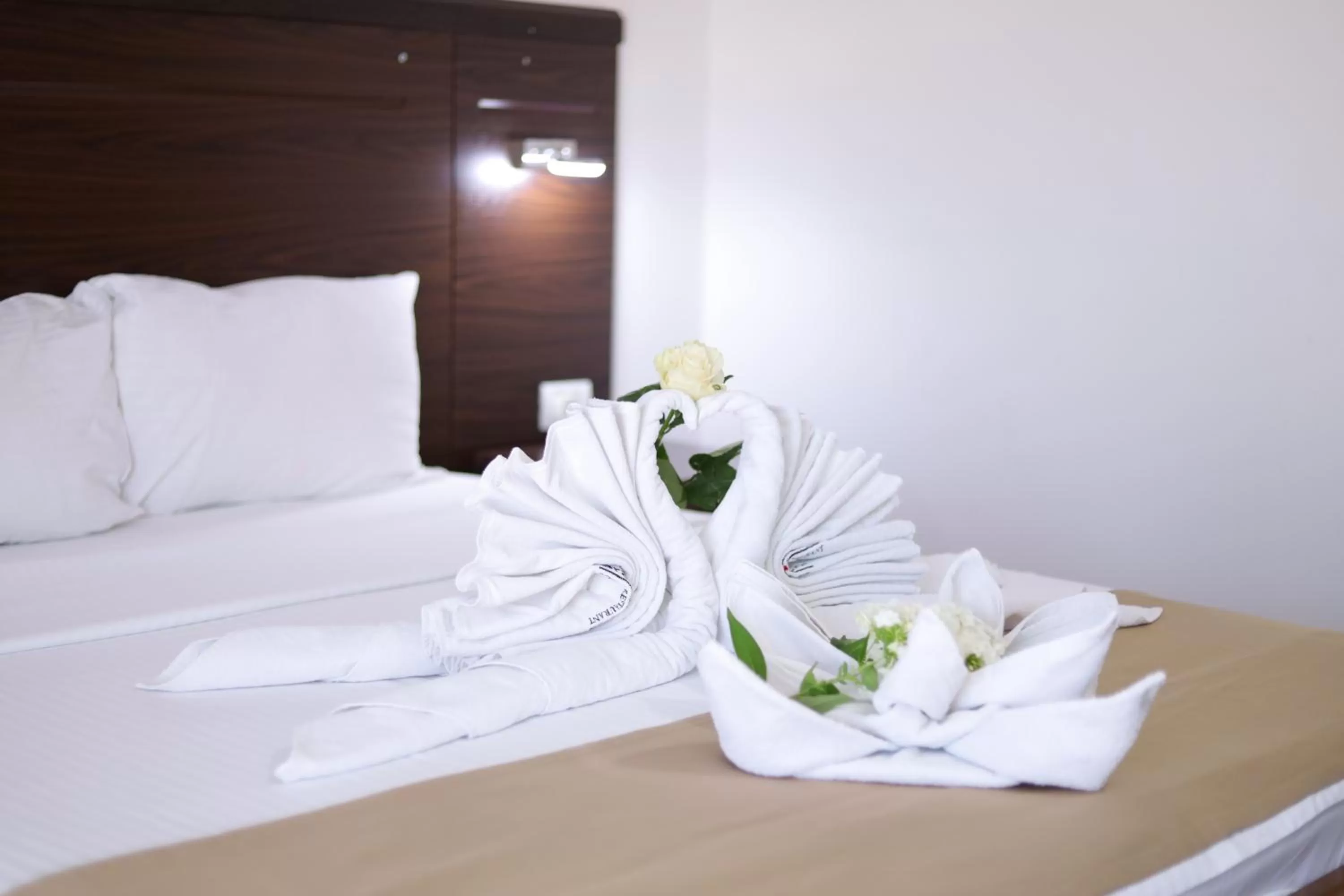 Bed in Arabella Hotel