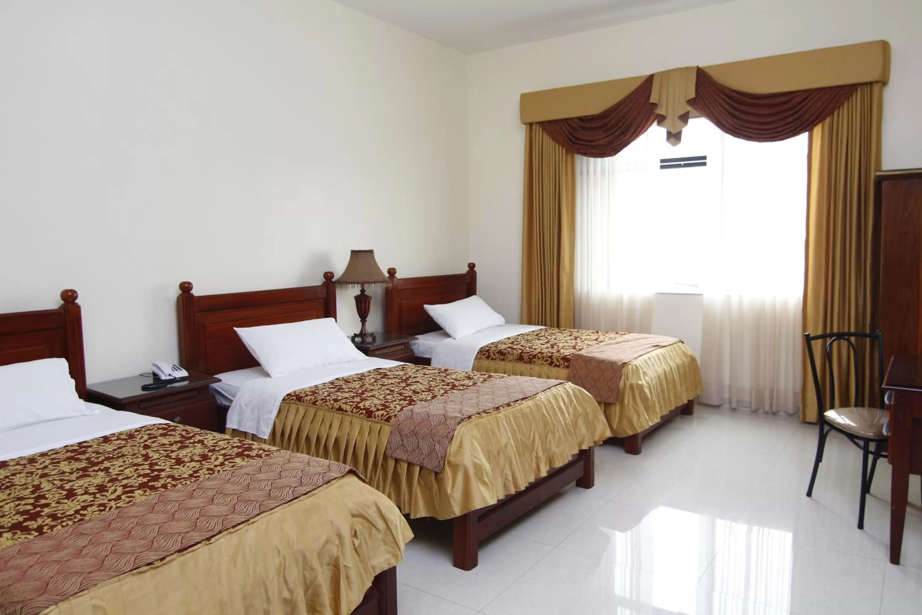 Bed in Hotel Versailles Internacional