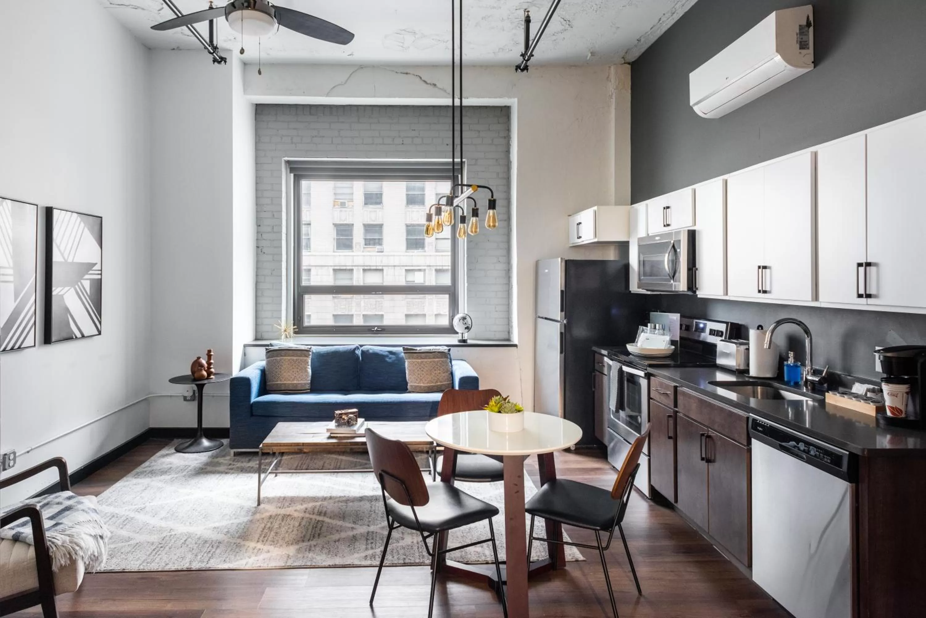 Living room, Kitchen/Kitchenette in Mint House Detroit - Times Square