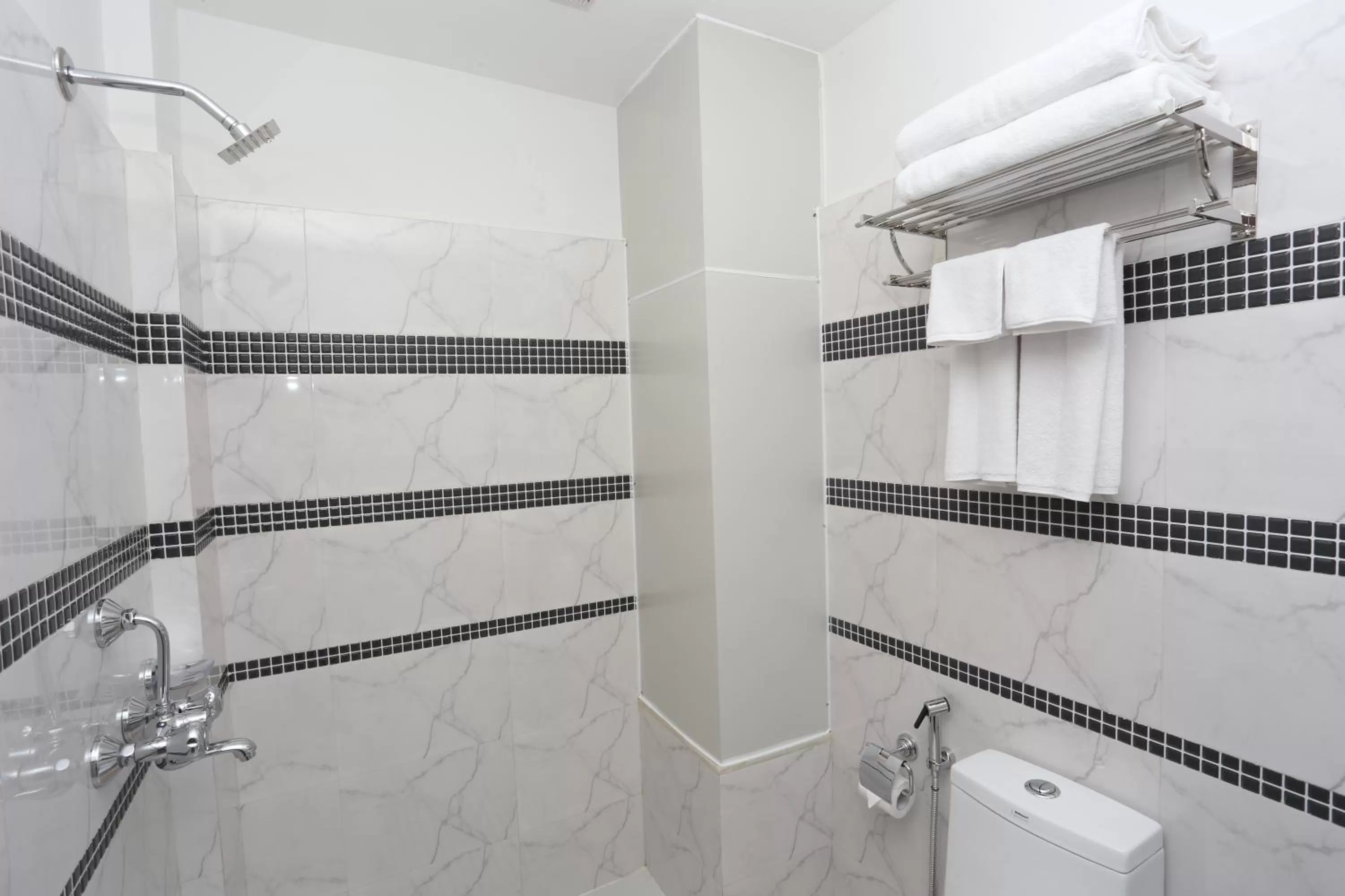 Bathroom in Hotel Jay Suites