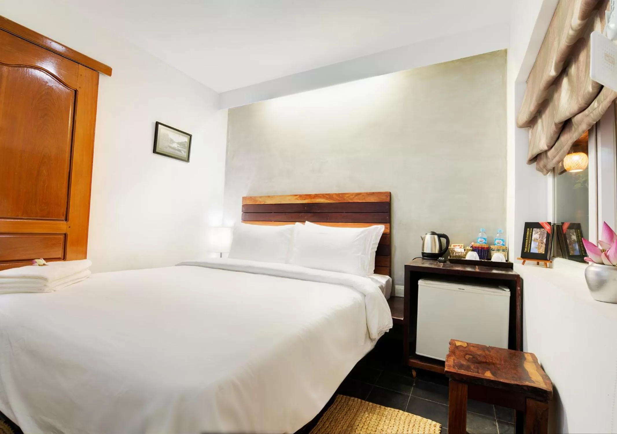 Bed in Maison Model d'Angkor