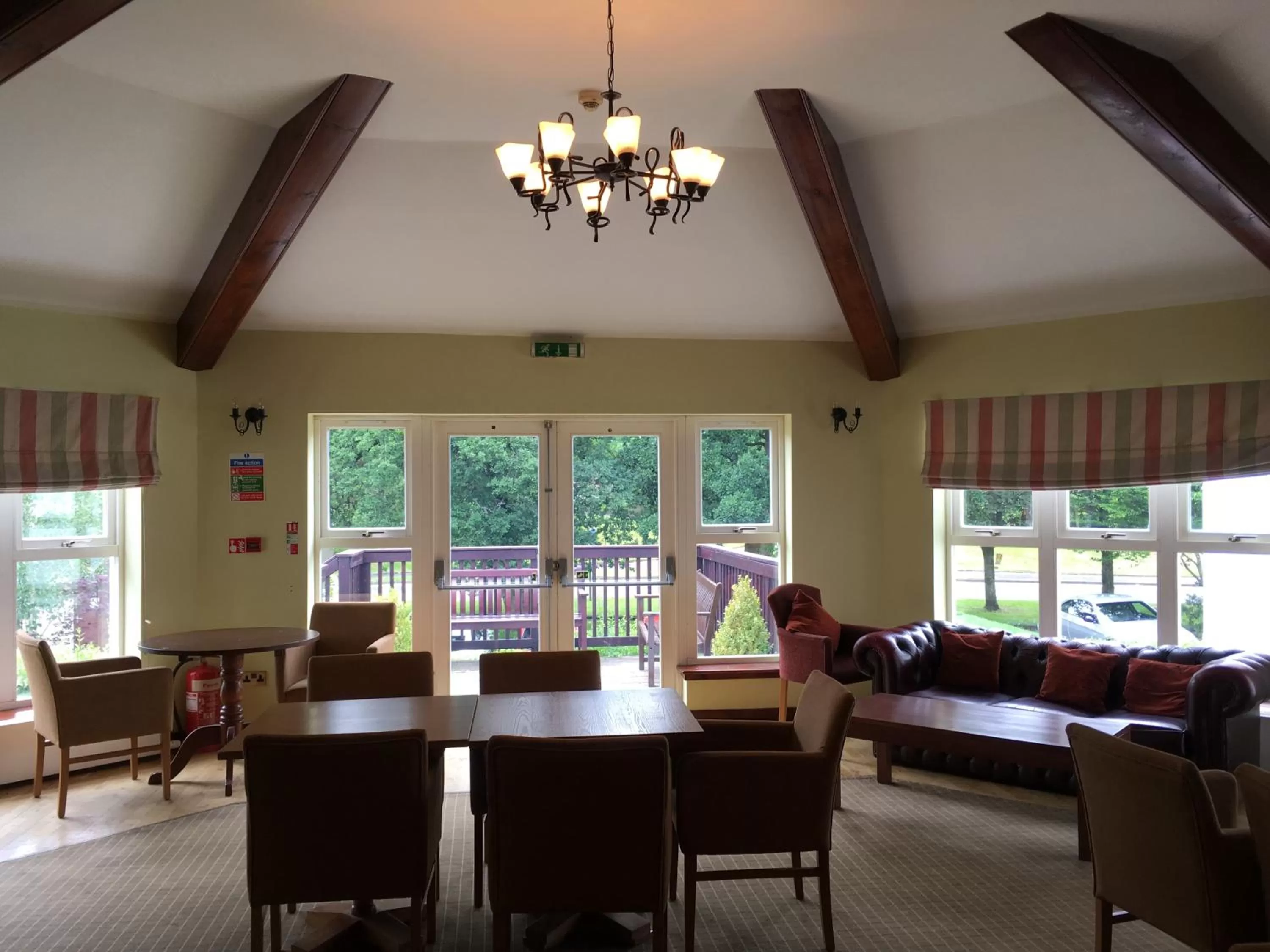 Communal lounge/ TV room in The Winnock Hotel