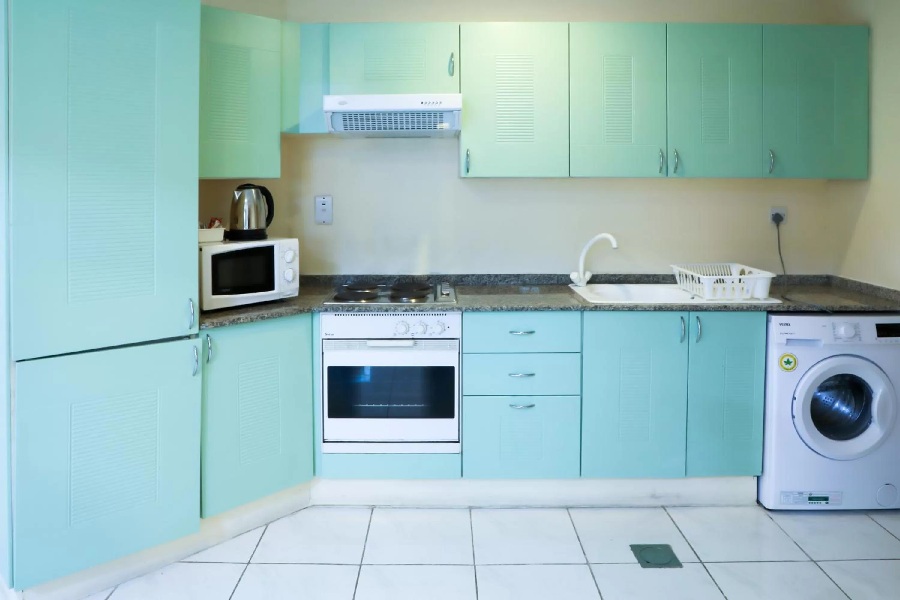 kitchen in West Zone Pearl Hotel Apartment