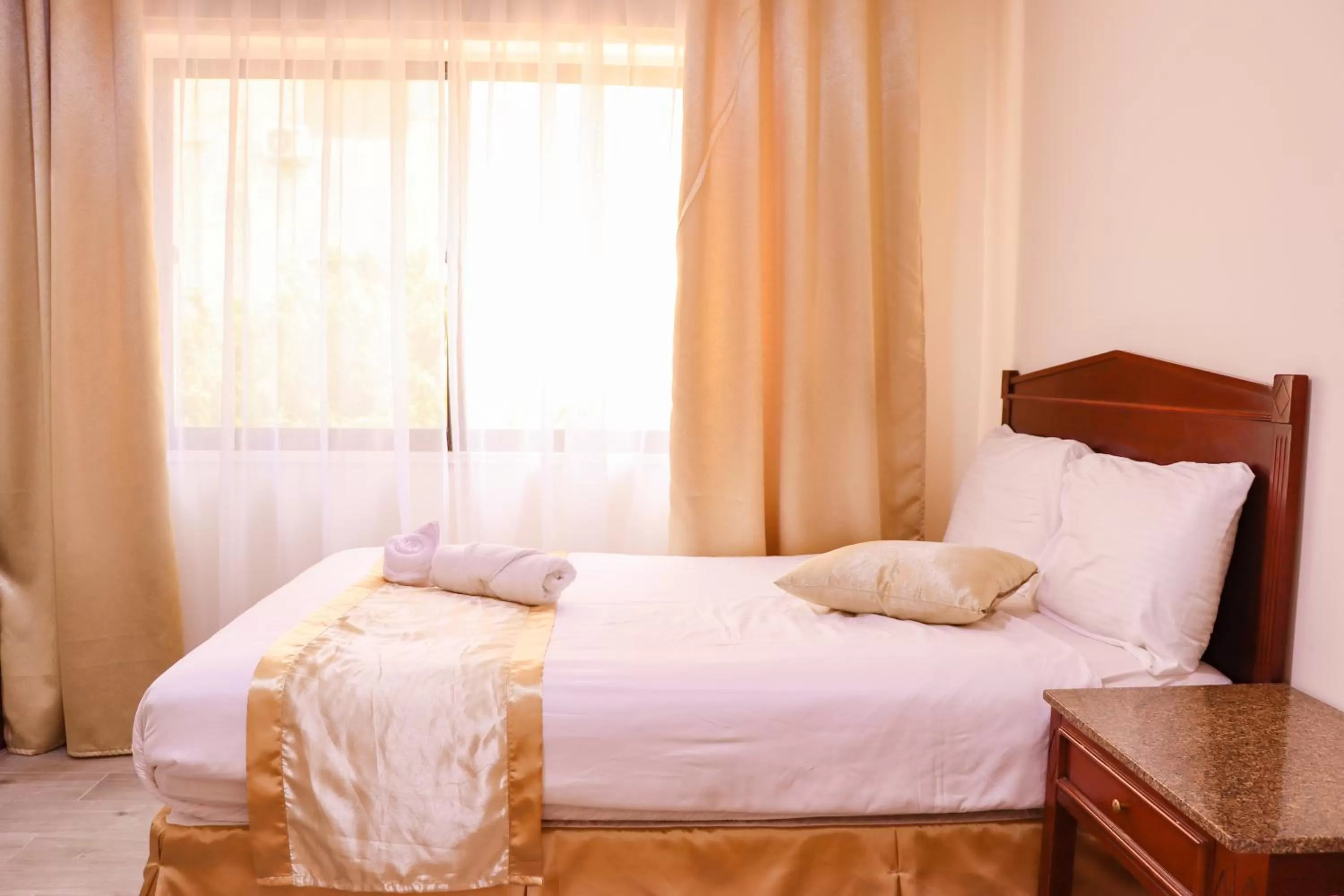 Bed in Al Jamal Suites