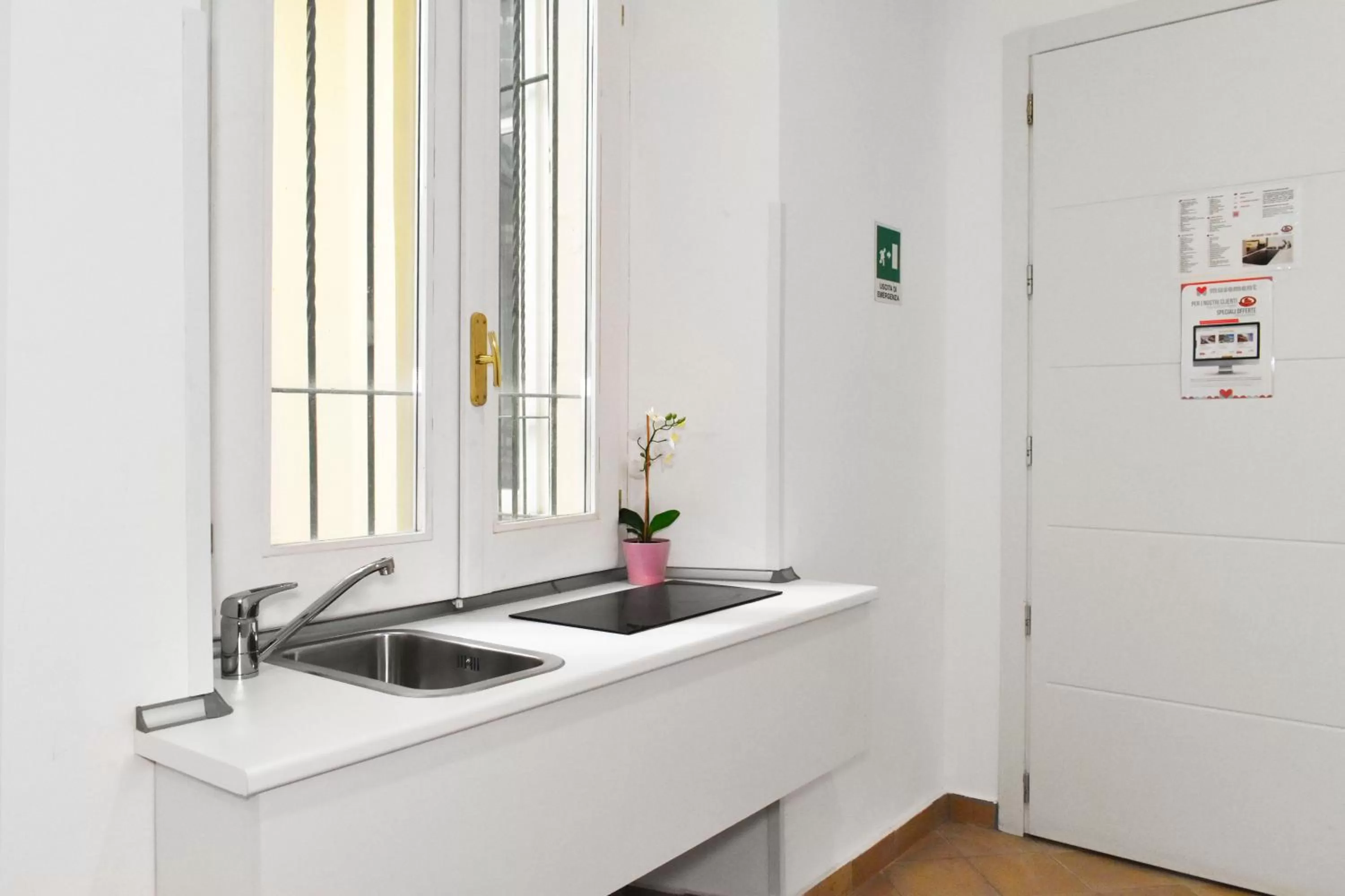 Kitchen or kitchenette in Roma Resort Colosseum