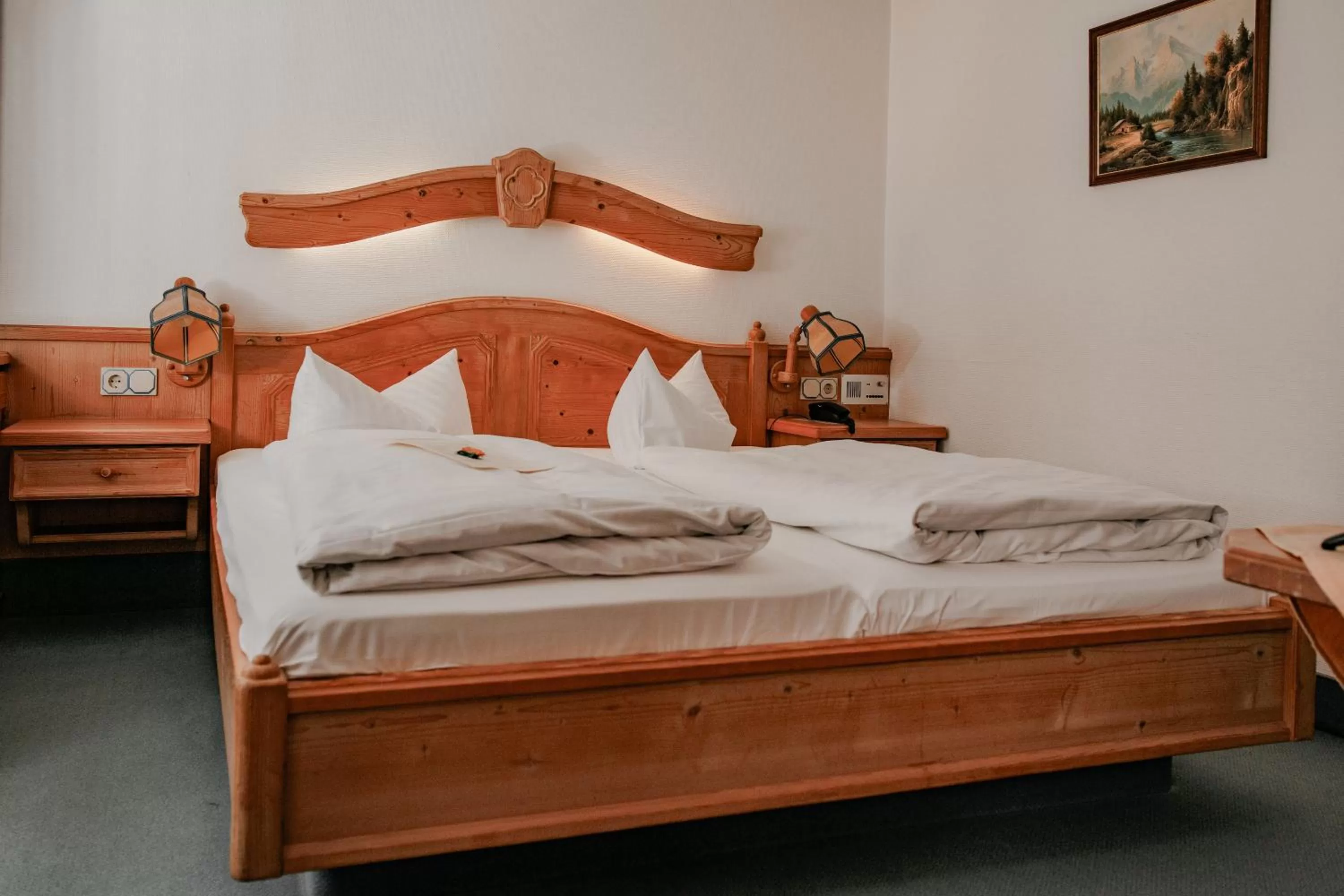 Bed in Hotel Vier Jahreszeiten