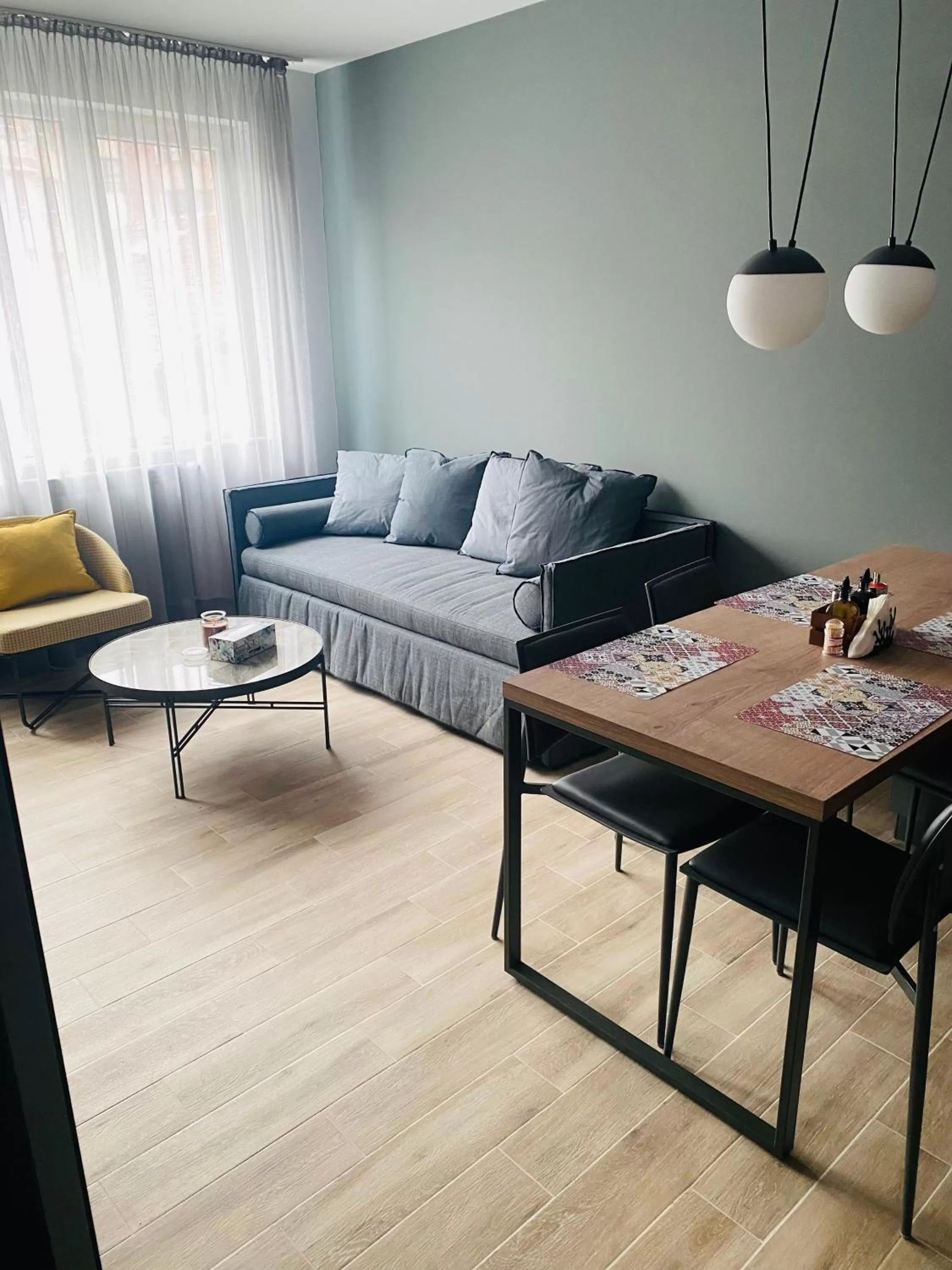 Living room, Seating Area in 7th Sense boutique apartments