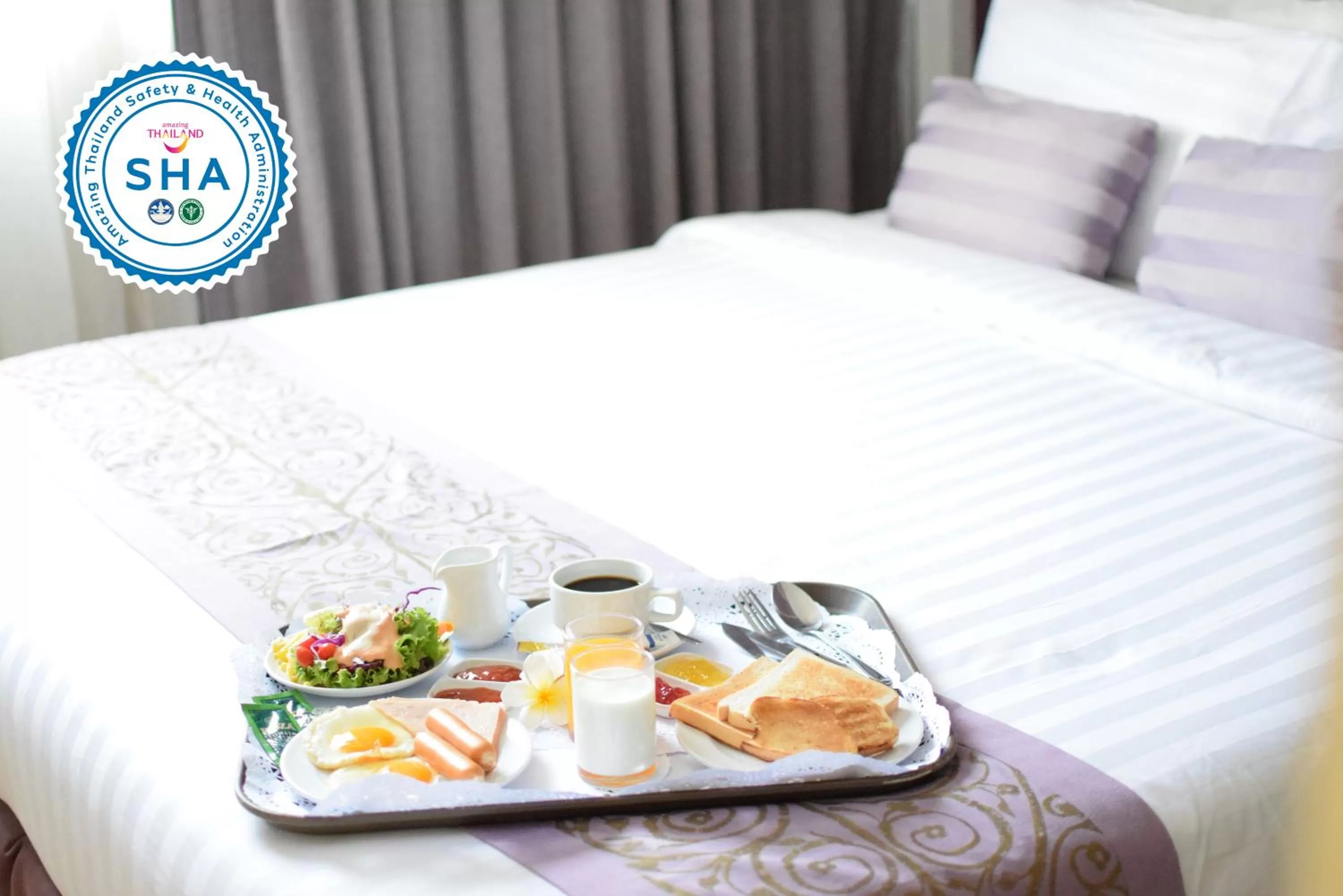 Bed in Trang Hotel Bangkok - SHA Plus