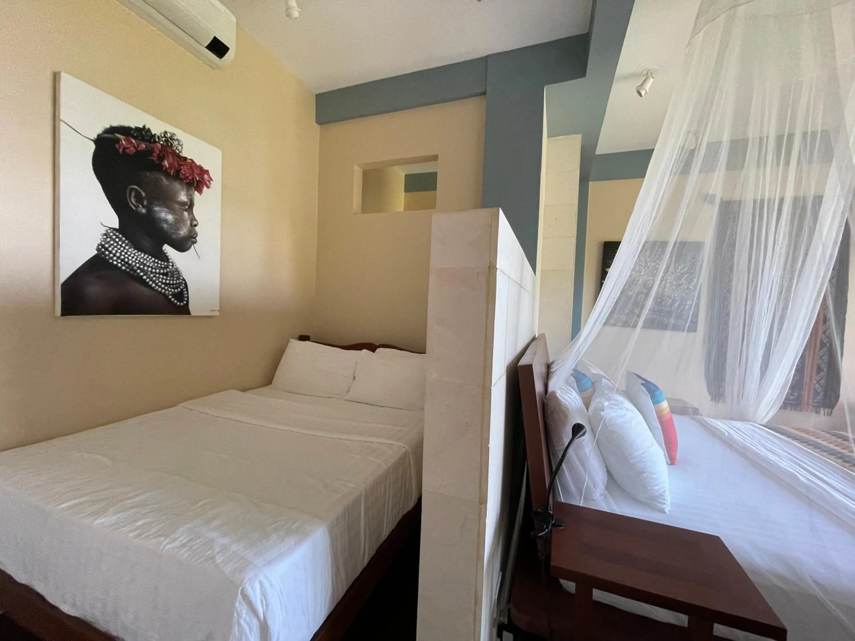 Bed in Karuna El Nido Villas