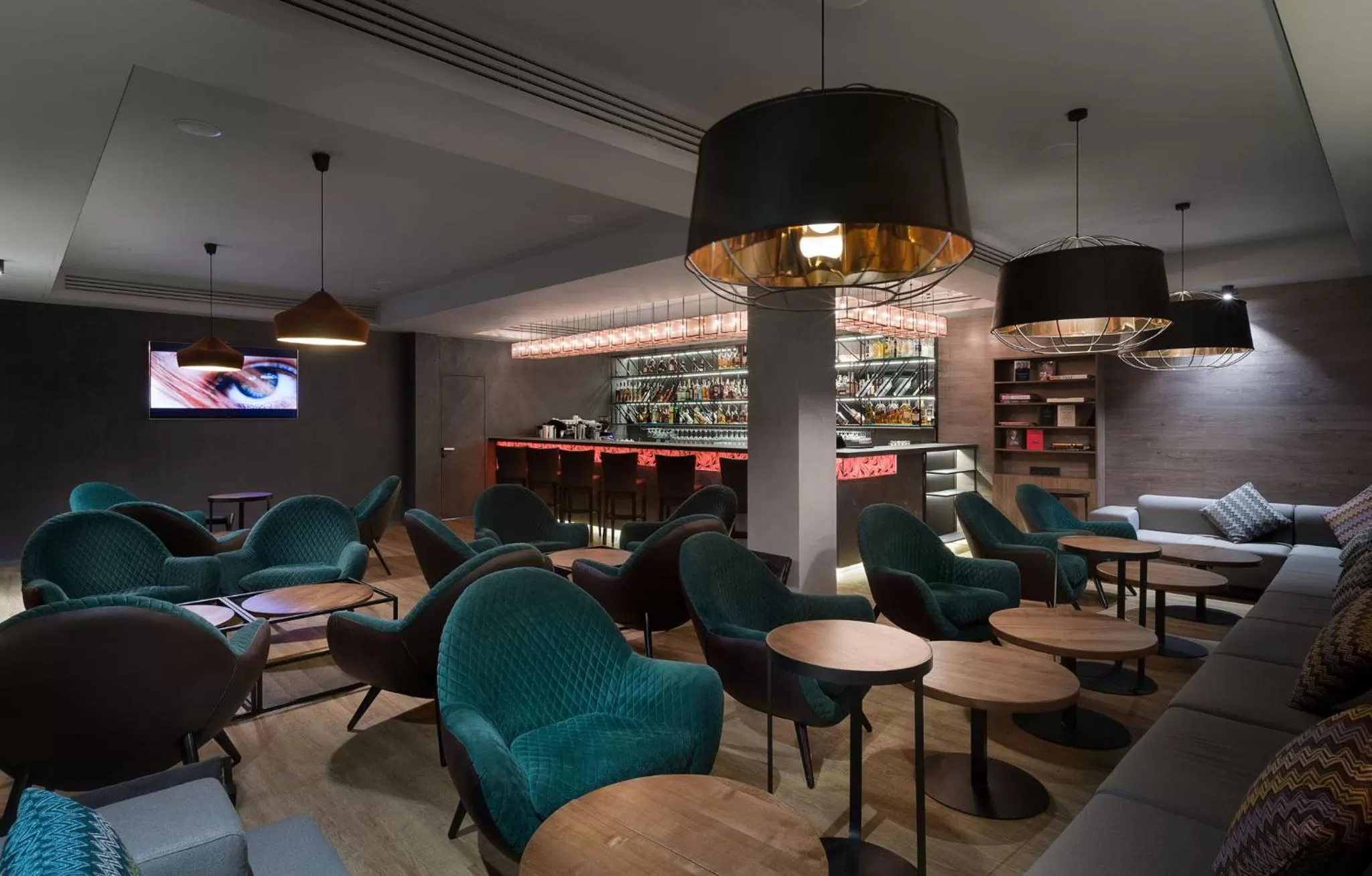 Communal lounge/ TV room in ONOVO Dendra Hotel