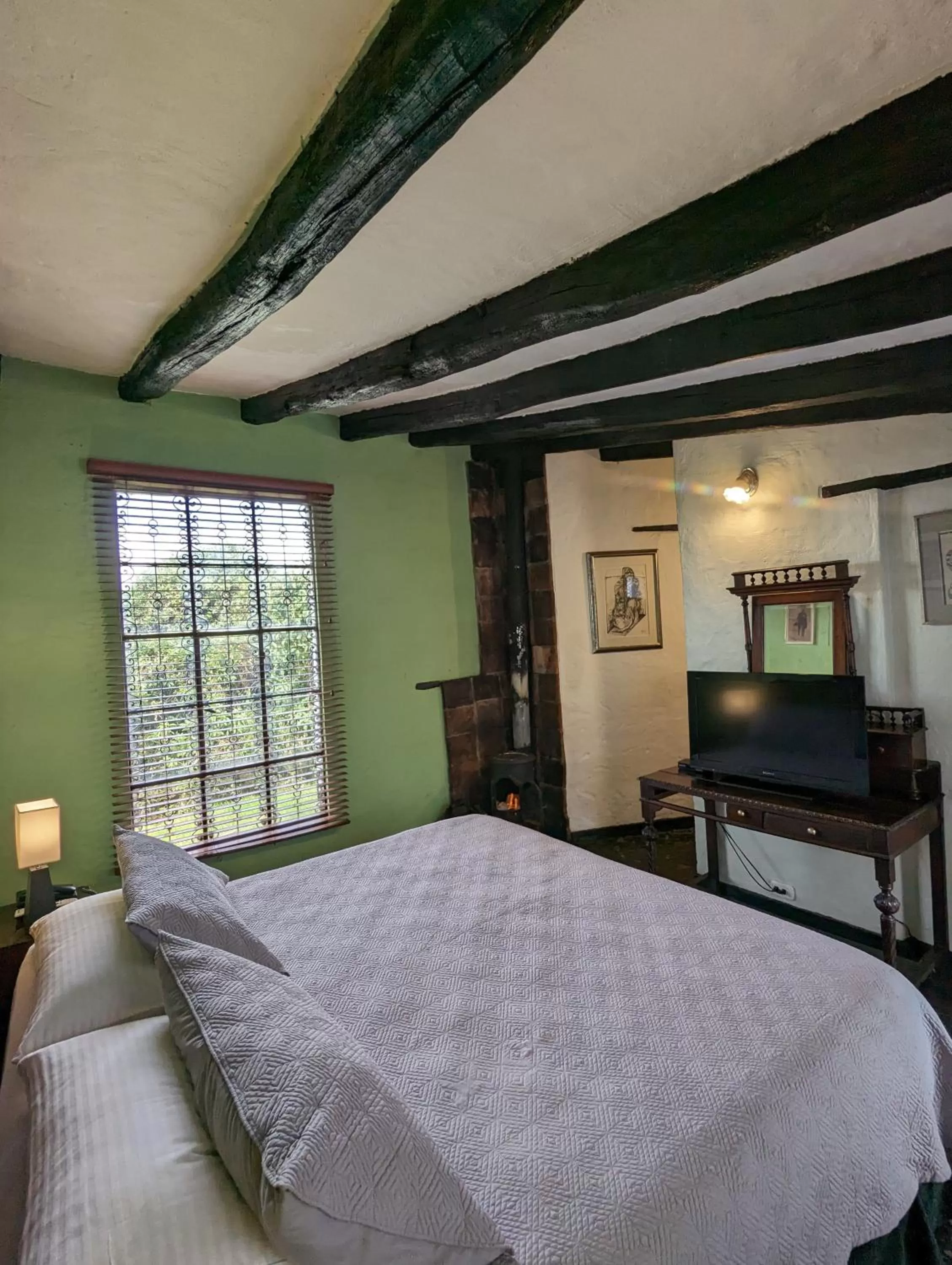 Photo of the whole room, Bed in Posada Cafe La Huerta