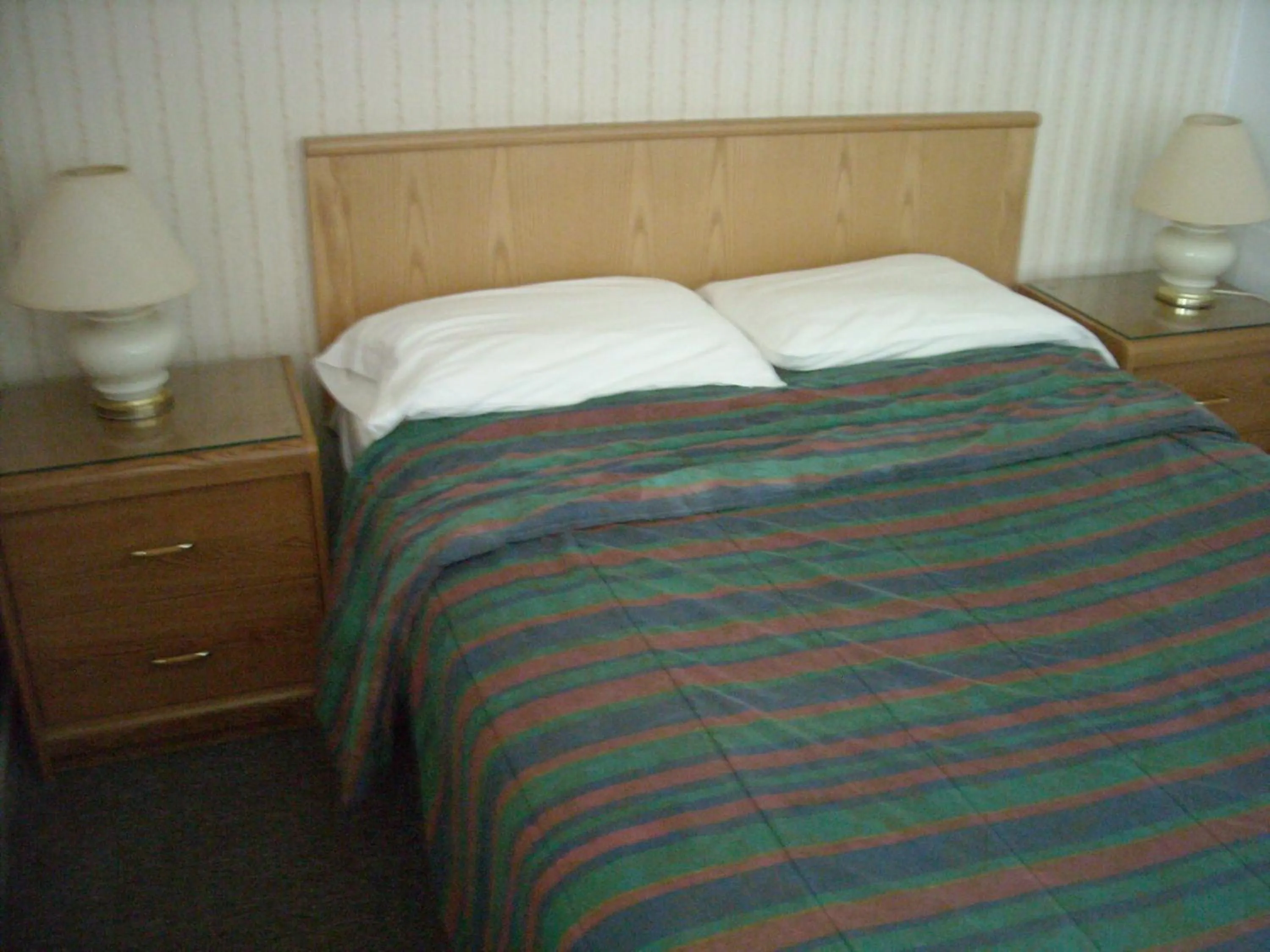 Bed in Motel le Verseau