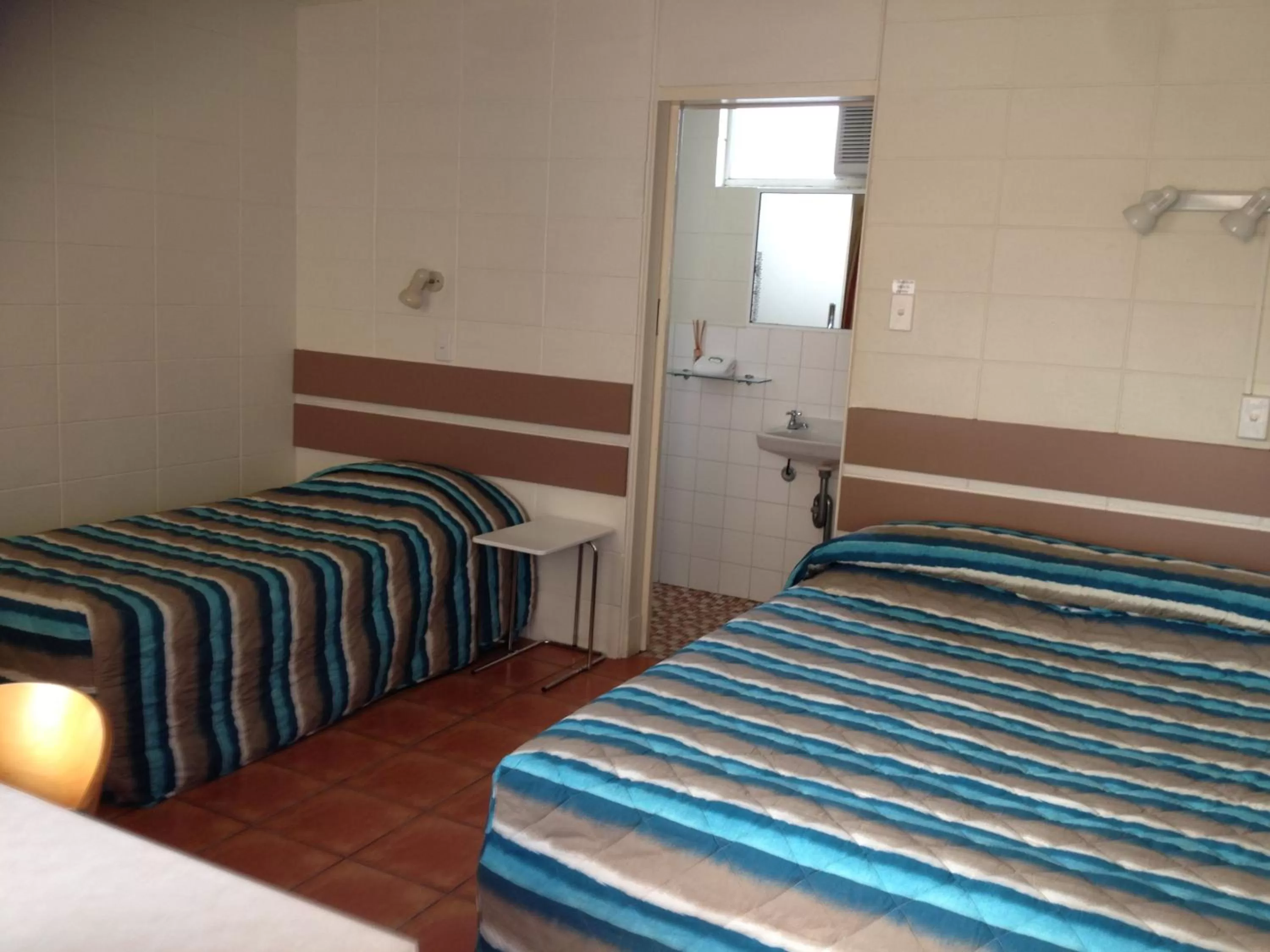 Bed in Sunburst Motel