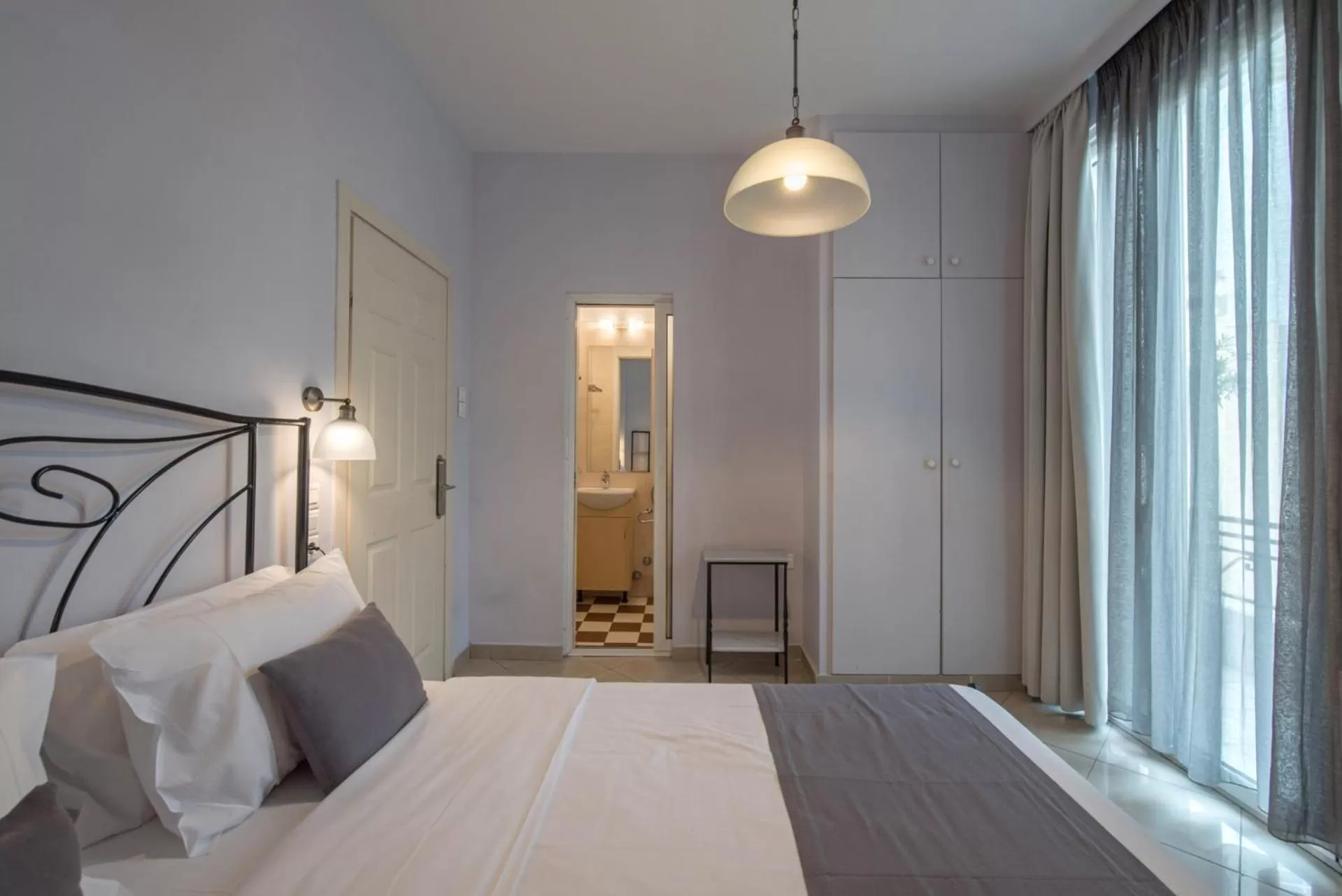 Bed in Kimon Hotel Athens